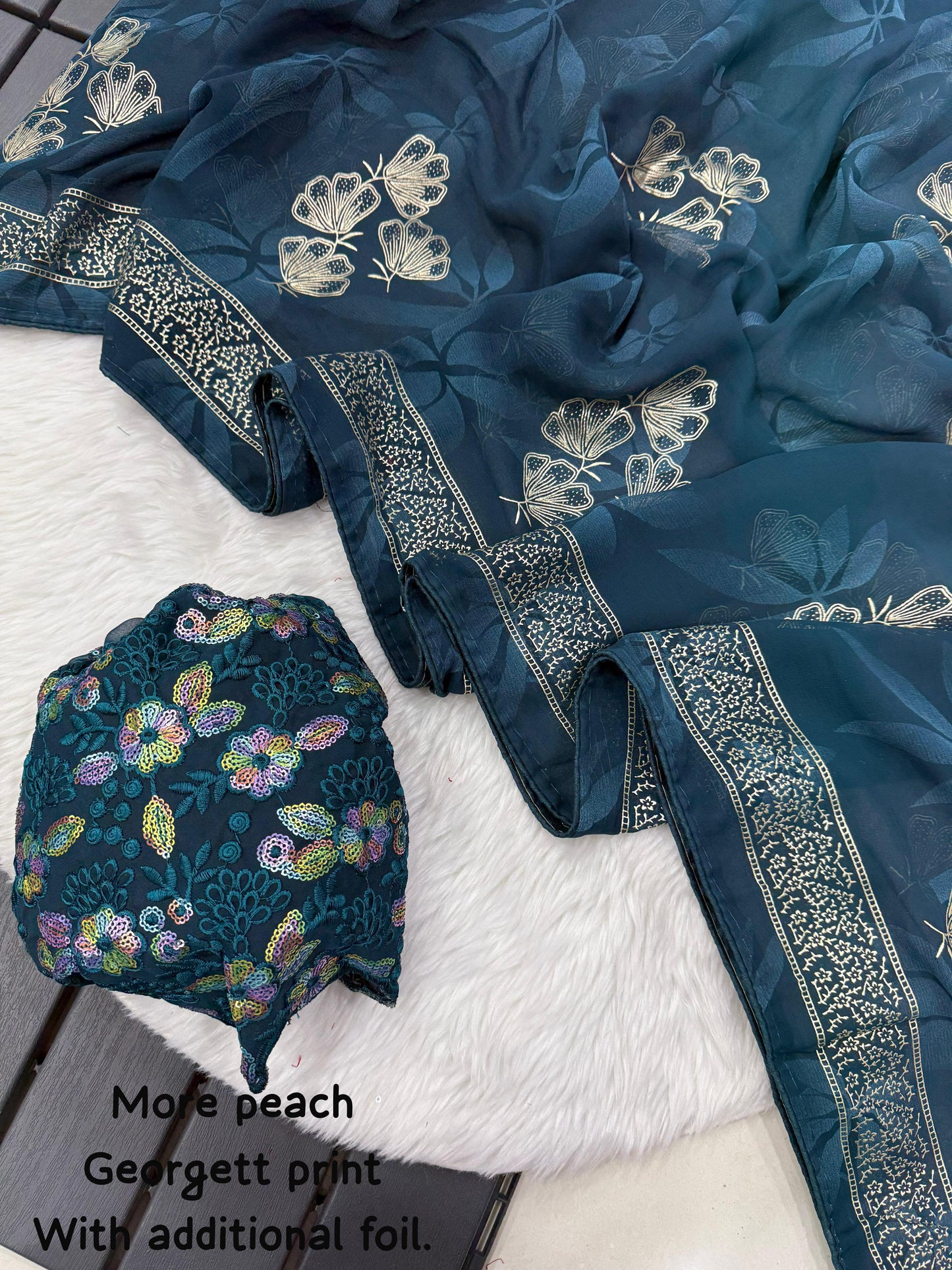 NN-2005 Georgette print fabric with additional smoke work with beautiful leather foil with heavy tone to tone embroidary blouse