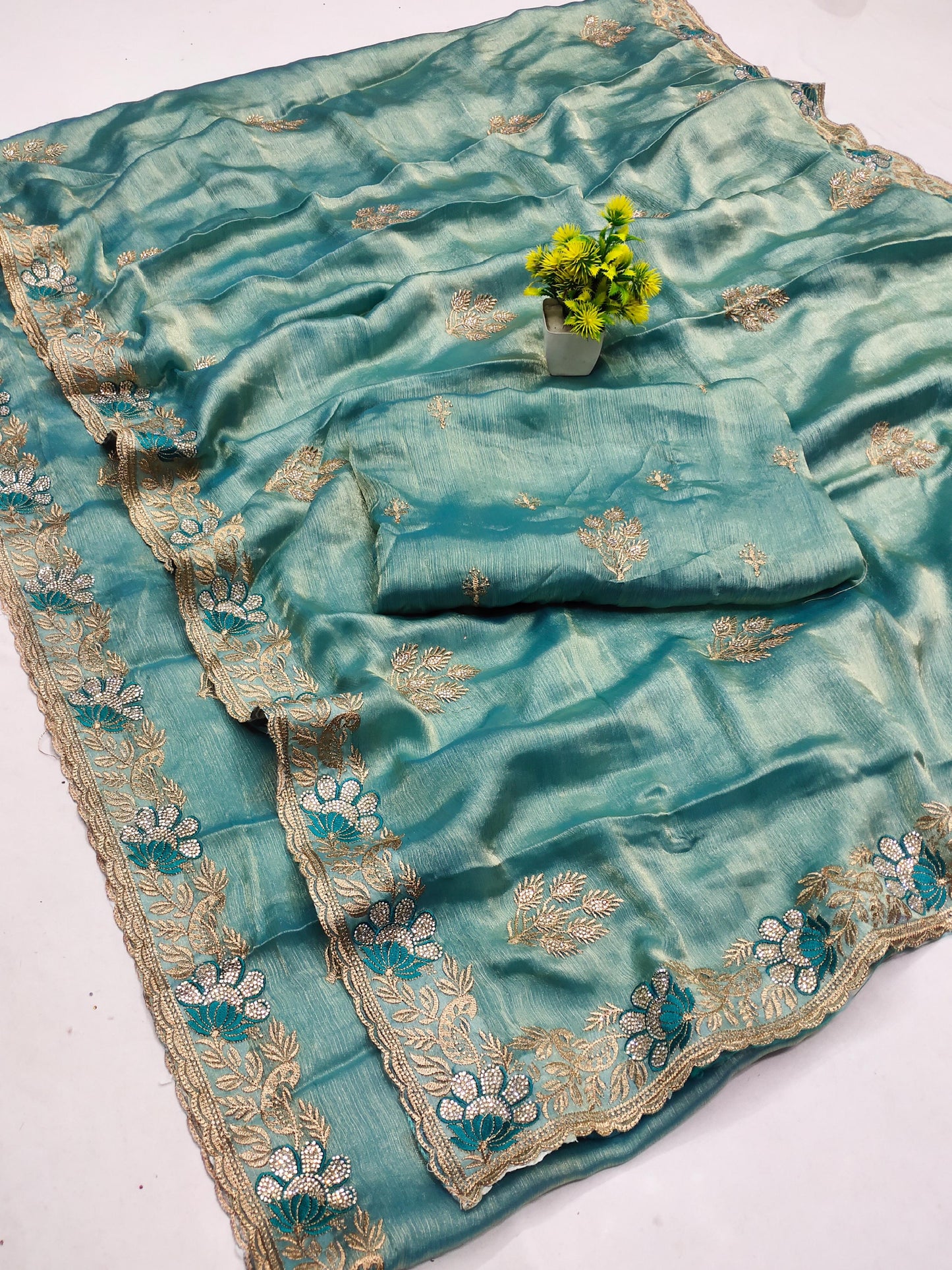 DF-RADHA FENDI GOLD SAREE WITH LOTUS DESIGNED WITH THREAD WORK DIAMOND ON BUTTI WITH HEAVY BLOUSE