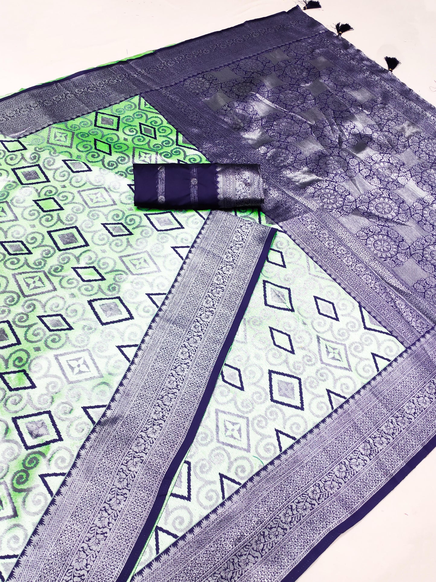 AJ-GEETANJALI PREMIUM SILVER PATTU SAREE WITH BEAUTIFUL BATIK PRINT ON BODY WITH SILVER JAREE BORDER WITH RICH PALLU AND TASSELS ATTACHED ON IT