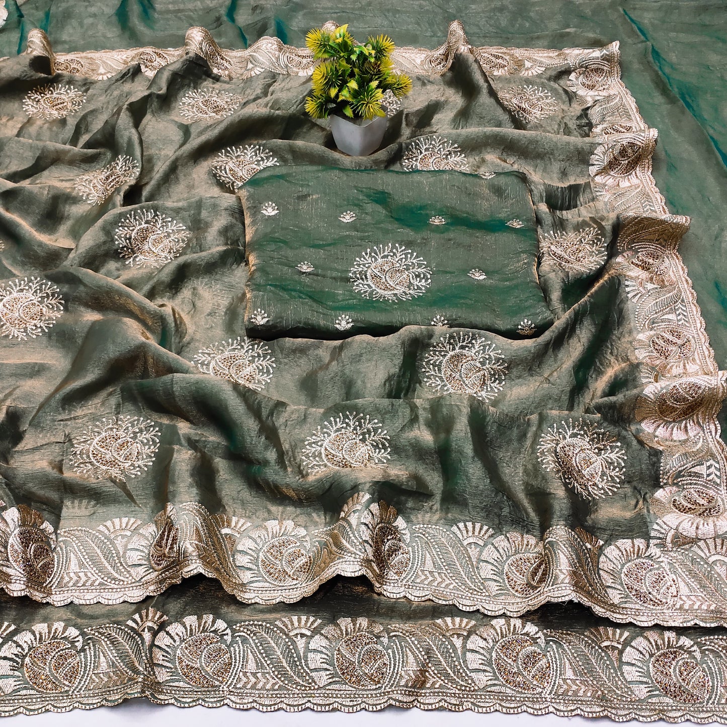 DF-RAGUNATH FENDI GOLD SAREE WITH BEAUTIFUL EMBORIDERY WORK CRAFTED WITH GOLD SIROSKI WORK WITH HEAVY BLOUSE