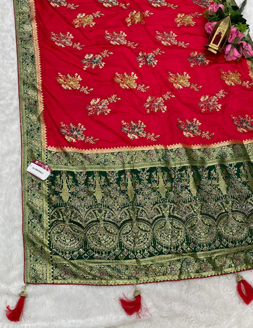 AJ-MANALI SATIN SILK WITH BEAUTFUL PALLU WITH HEAVY DESIGN WITH HEAVY JARKAN WORK WITH MEENAKARI WORK AND LUXURIOUS TASSELS WITH CONTRAST BUTTI BLOUSE