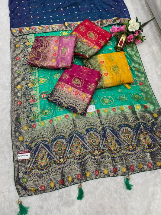 AJ-GUNJAN FENDI SILK FABRIC SAREE WITH 2D DYING WORK WITH MEENAKARI WORK AND DIAMOND WORK WITH PEACOCK FIGURE DESIGN WITH CONTRAST BLOUSE AND PALLU WITH LUXURIOUS TASSELS WITH BUTTI BLOUSE