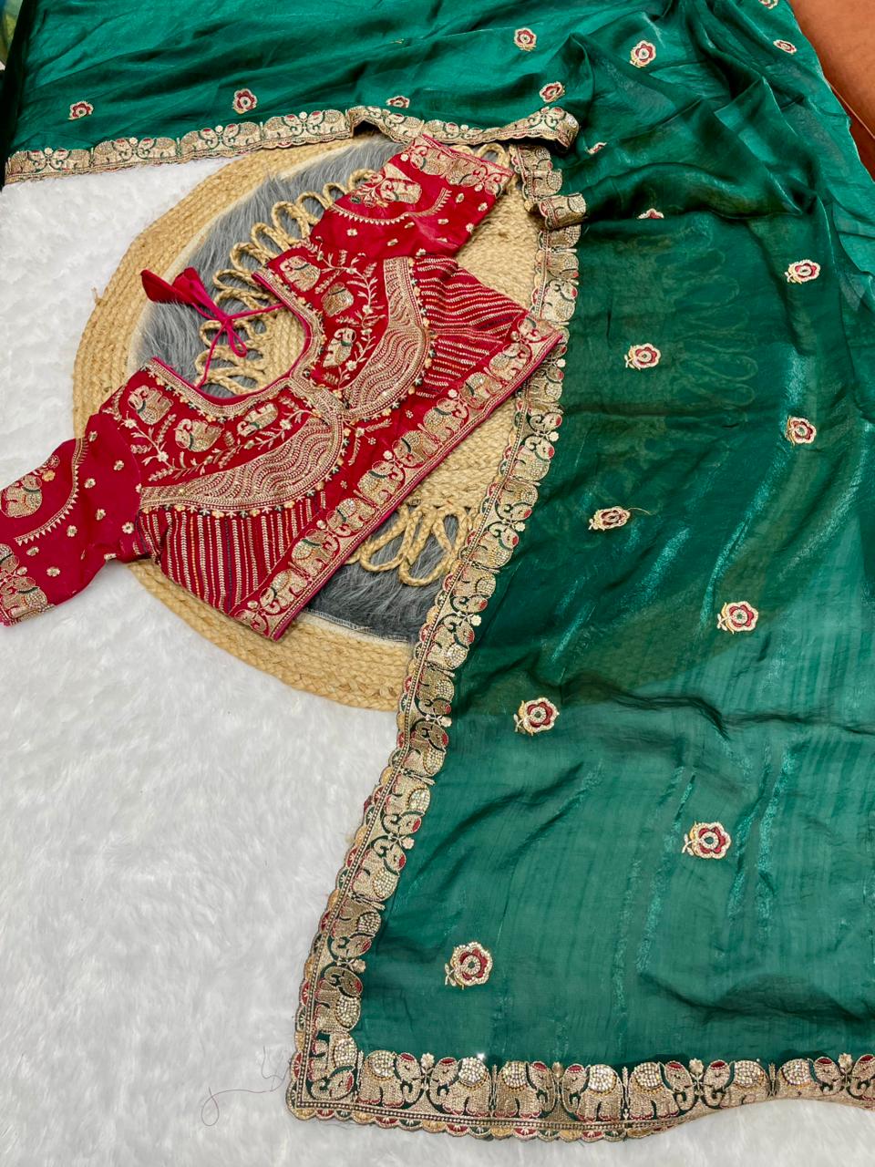 BS-JAGRUTI SATIN SAREE WITH HEAVY EMBROIDERY WORK WITH GAJRAJ DESIGN WITH JARKAN WORK WITH HEAVY STICHED BLOUSE