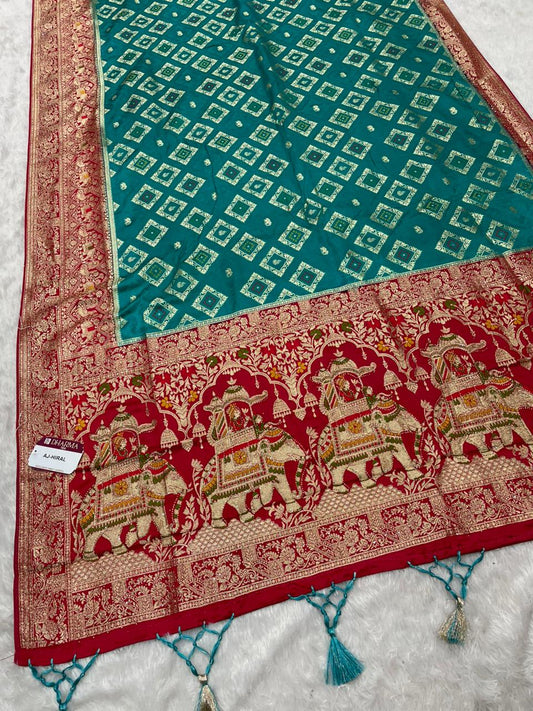 AJ-HIRAL NYLON SATIN SAREE WITH BEAUTIFUL CHAAP DYING WITH GAJRAJ PALLU WITH JARKAN AND MEENA WORK WITH BANDANI INSERTS ON BODY WITH BEAUTIFUL PANNEL DESIGN