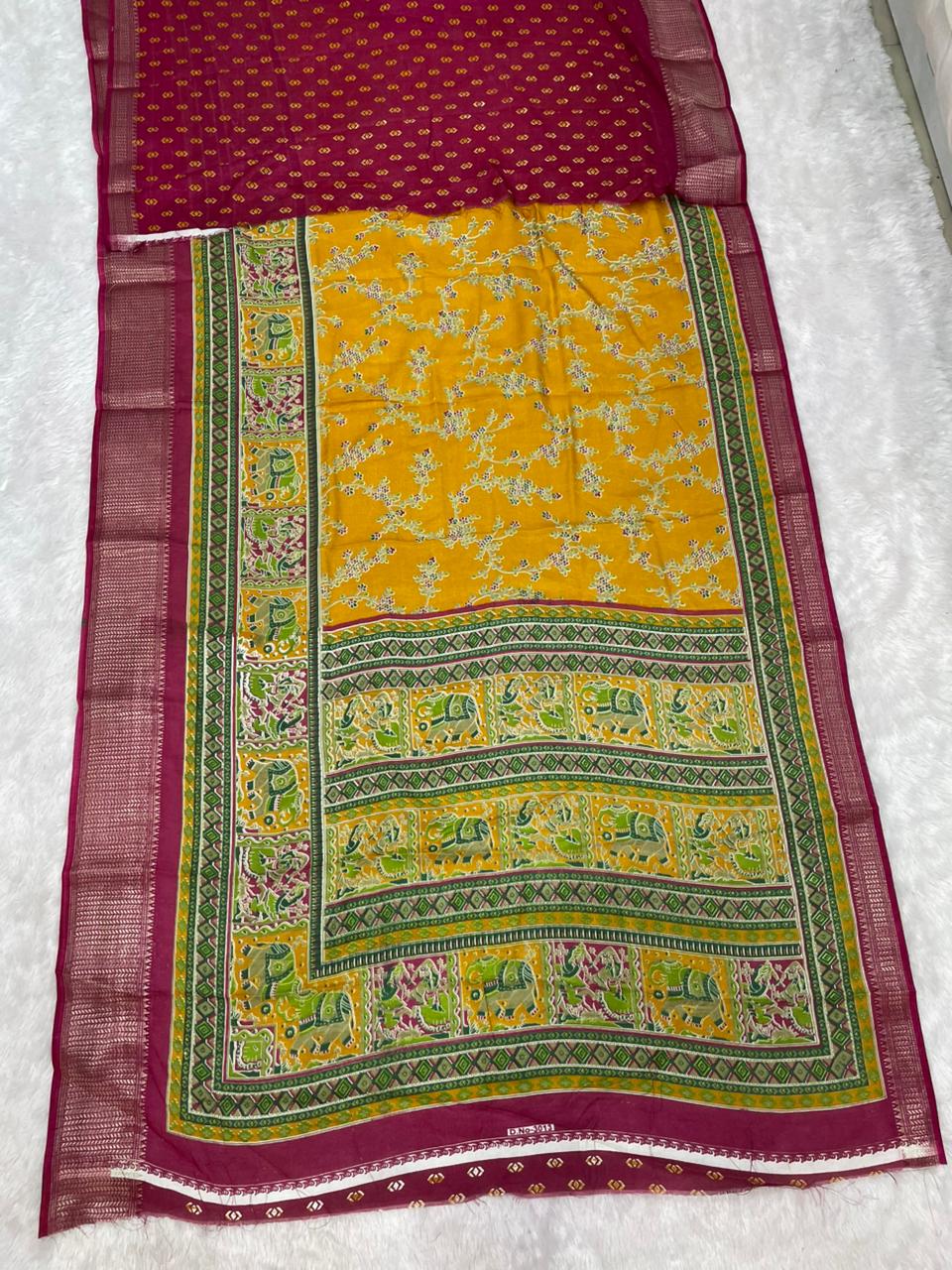 CP-7142 DOLA SILK FABRIC SAREE WITH BEAUTIFUL DESIGN WITH POSITION TYPE PRINT AND JHAL DEISGN ON BODY WITH BLOUSE