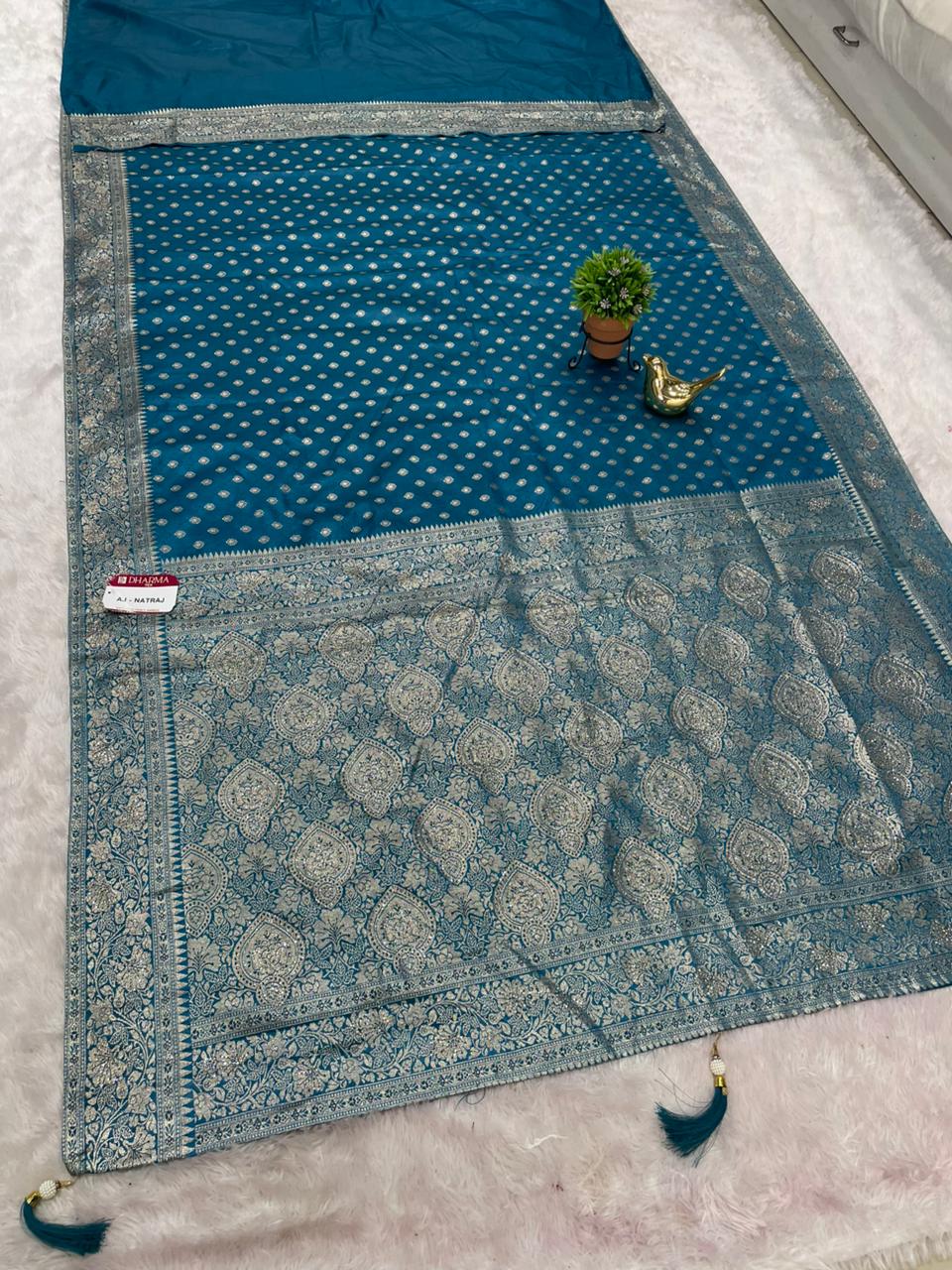 AJ-NATRAJ SATIN SILK FABRIC SAREE WIRH HEAVY SIROSKI WORK ON SAREE WITH BUTTI DESIGN ON ALL OVER ON BODY WITH LUXURIOUS TASSELS WITH BLOUSE