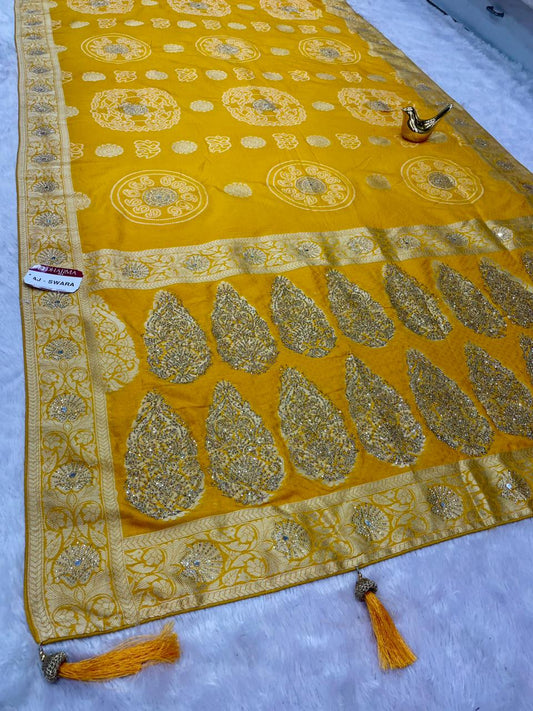 AJ-SWARA HEAVY GEORGETTE FABRIC SAREE WITH BEAUTIFUL BANDHANI DESIGN WITH HEAVY JARKAN WORK AND REAL MIRROR WORK WITH RICH PALLU DESIGN WITH BUTTI BLOUSE AND LATKAN AND PIPING