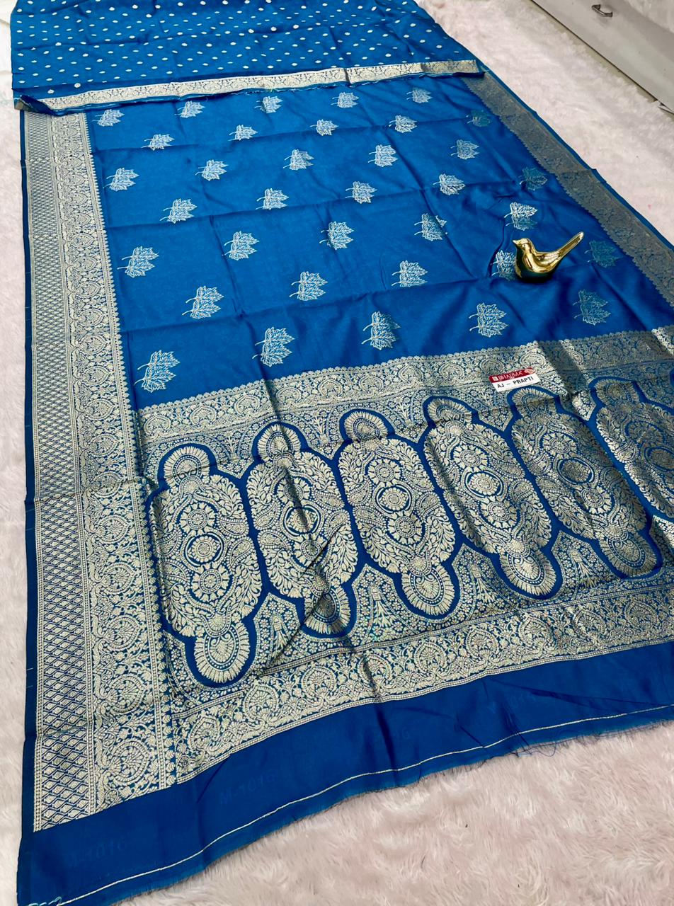 AJ-PRAPTI LITCHI KOTA FABRIC SAREE WITH RICH PALLU DESIGN WITH BANARSHI ZAREE WITH BEAUTIFUL FLOWER DESIGN WITH BUTTI BLOUSE