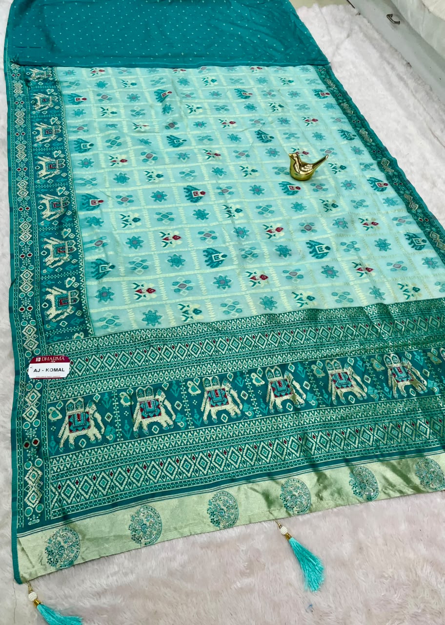 AJ-KOMAL COTTON FABRIC SAREE WITH BEAUTIFUL RICH PALLU DESIGN WITH BEAUTIFUL PATOLA DESIGN WITH LAGNI PATTA WITH TASSELS AND BLOUSE