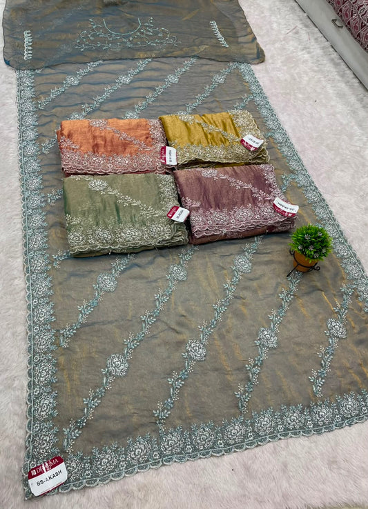 BS-AKASH FANCY FABRIC SAREE WITH HEAVY THREAD EMBROIDERY WITH SEQUENCE AND ELEGANT DIAGONAL FLORAL PATTERN ALL OVER SAREE WITH RICH EMBROIDERED SCALLOP BORDER WITH MATCHING DESIGNER BLOUSE WITH EMBROIDERY WORK