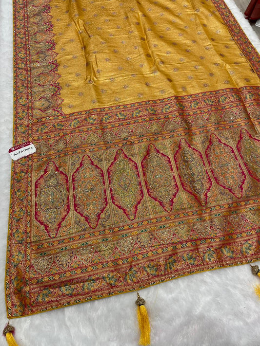 AJ-PATRIKA PREMIUM TISSUE SILK WITH POSITION STYLE WEAVING WITH HEAVY JARKAN WORK WITH CONTRAST PIPING AND LATKAN WITH BROCADE BLOUSE