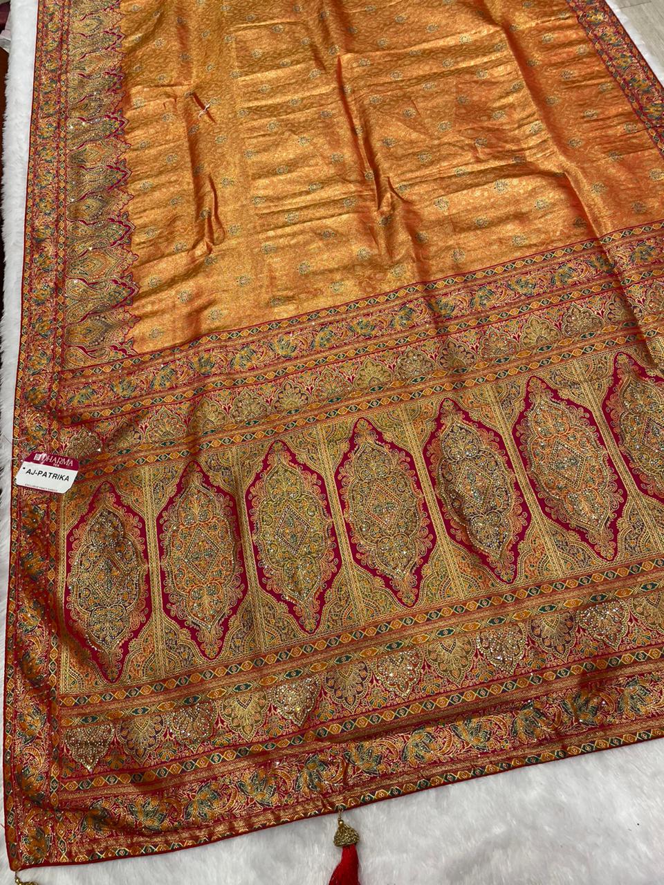 AJ-PATRIKA PREMIUM TISSUE SILK WITH POSITION STYLE WEAVING WITH HEAVY JARKAN WORK WITH CONTRAST PIPING AND LATKAN WITH BROCADE BLOUSE