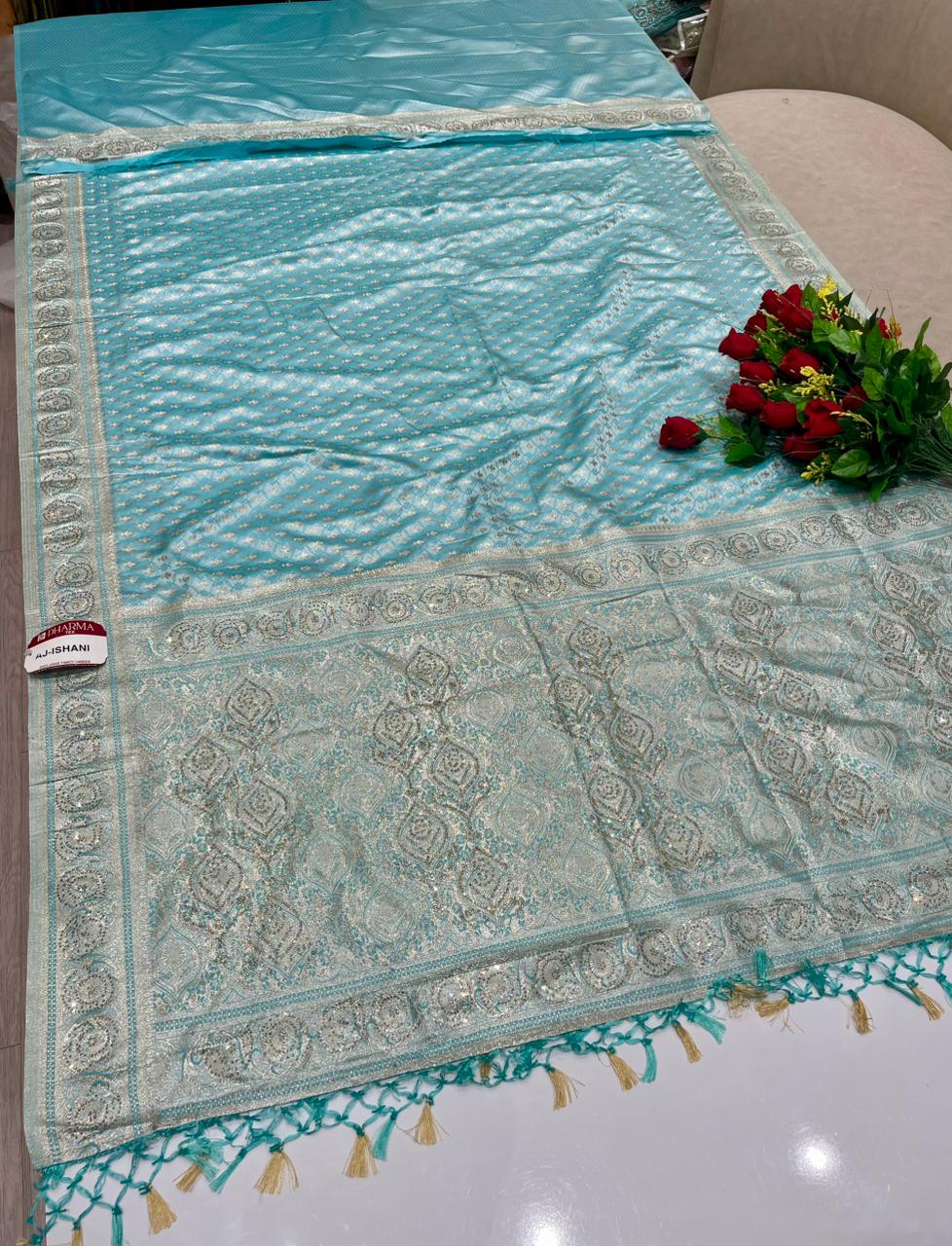 AJ-ISHANI SATIN SILK FABRIC SAREE WITH RICH PALLU DESIGN WITH HEAY JARKAN WORK WITH BEAUTIFUL TASSELS WITH BLOUSE