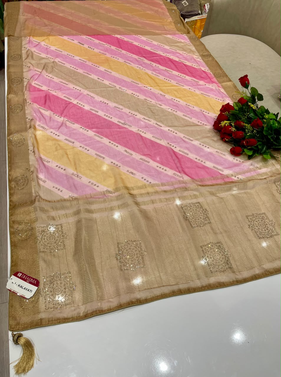 AJ-KALAVATI FANCY FABRIC SAREE WITH BEAUTIFUL SIROSKI WORK ON PALLU WITH LOVELY LAHARIYA DESIGN WITH BLOUSE