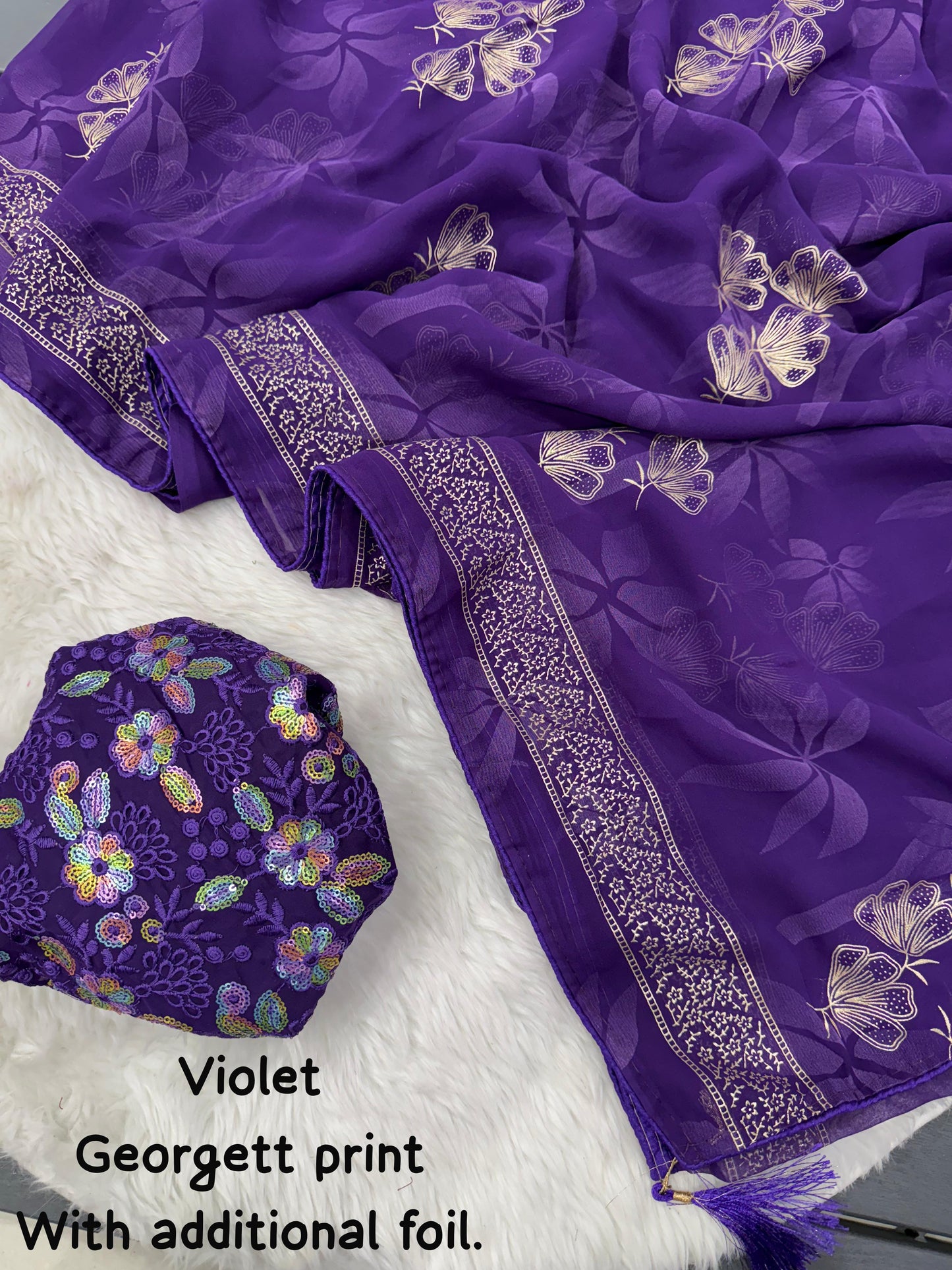 NN-2005 Georgette print fabric with additional smoke work with beautiful leather foil with heavy tone to tone embroidary blouse
