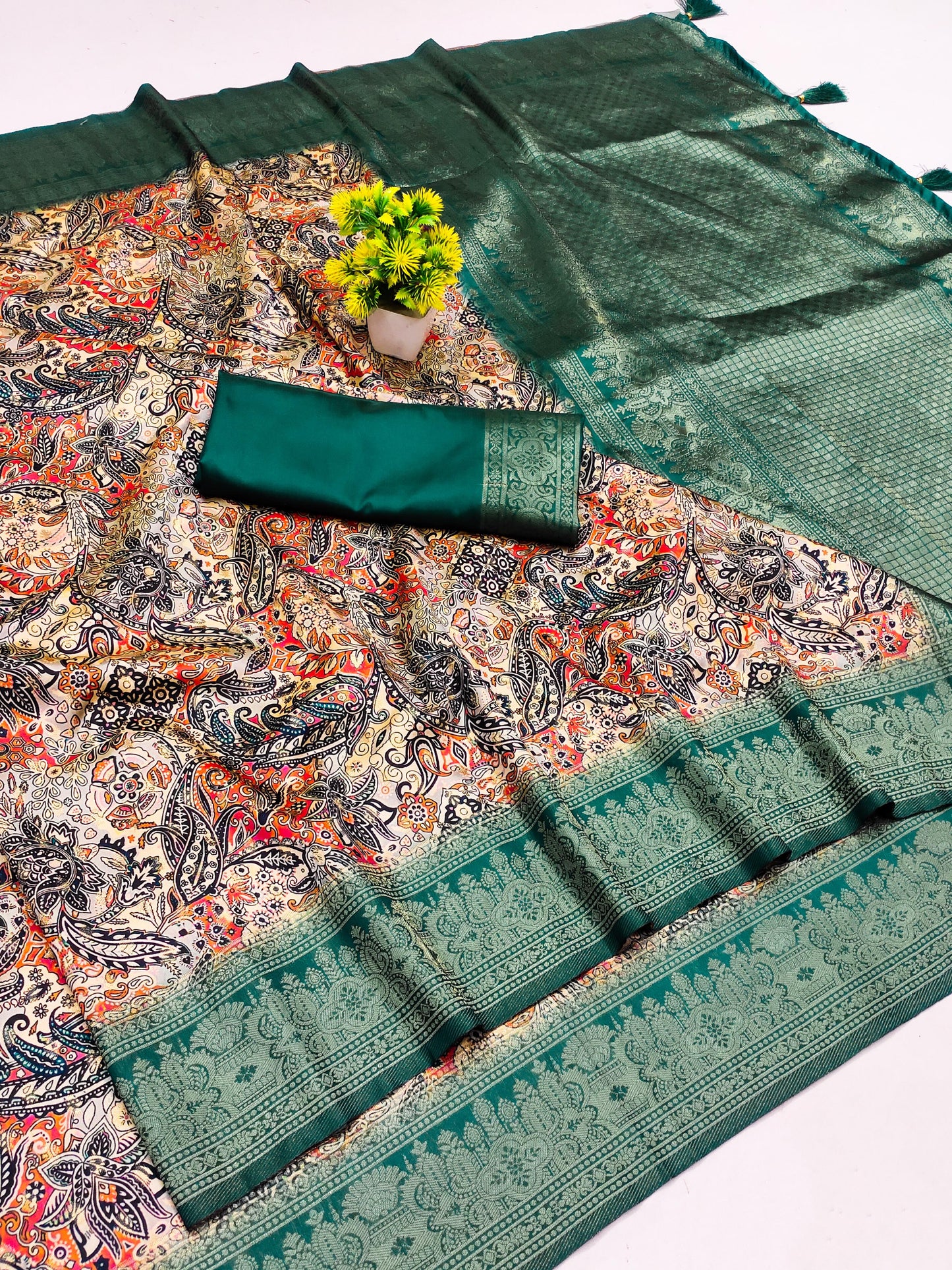 DP-NEWYORK ITALIAN DOLA SILK SAREE WITH BEAUTIFUL FLORAL DESIGN WITH PREMIUM BORDER DESIGN WITH RICH PALLU WITH TASSELS ATTACHED