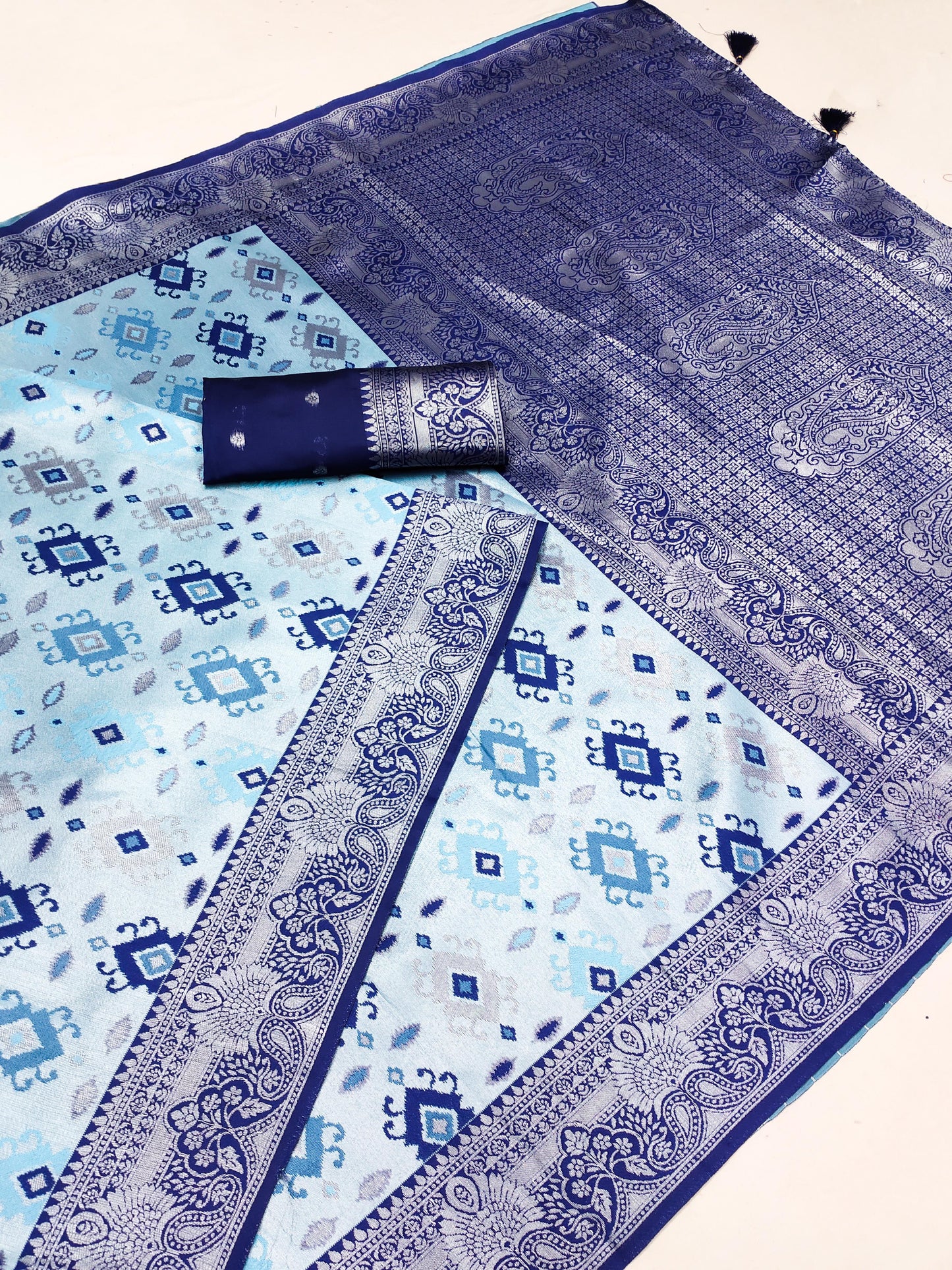 AJ-NIHARIKA PREMIUM SILVER PATTU SAREE WITH BEAUTIFUL BATIK PRINT ON BODY WITH SILVER JAREE BORDER WITH RICH PALLU AND TASSELS ATTACHED ON IT