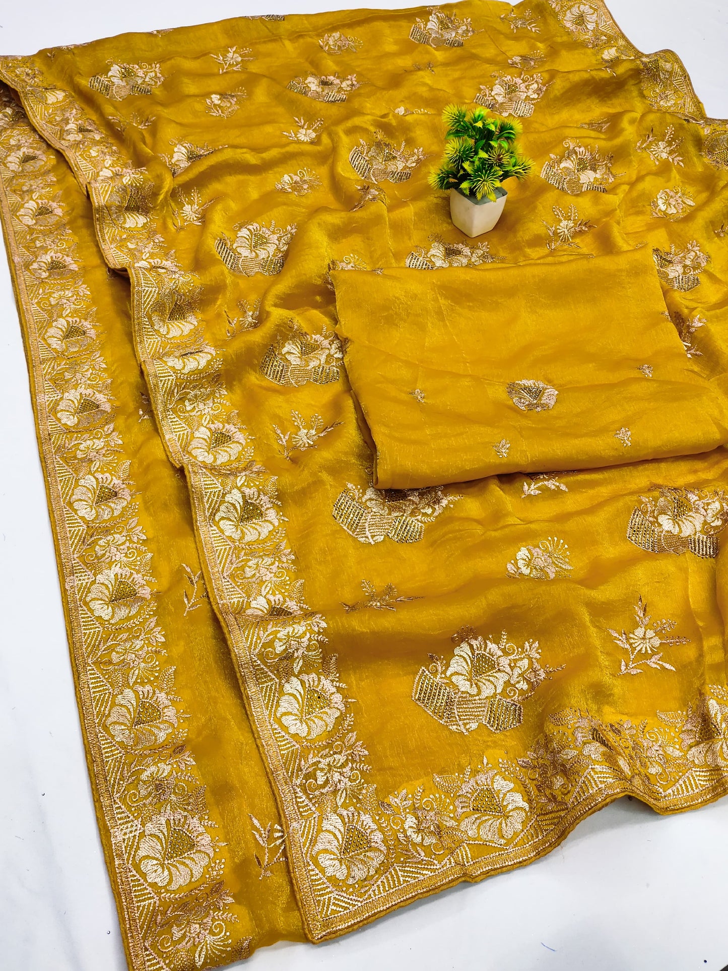 DF-HALDI FENDI CHIFFON SAREE WITH BEAUTIFULLY CRAFTED EMBROIDERY WORK WITH SIROSKI WORK AND HEAVY BLOUSE