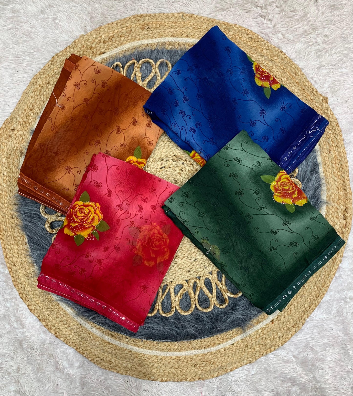 RR-KALAI WEIGHTLESS GEORGETTE SAREE WITH BEAUTIFUL PRINT WITH SIROSKI BORDER AND SIROSKI ON BUTTHA
