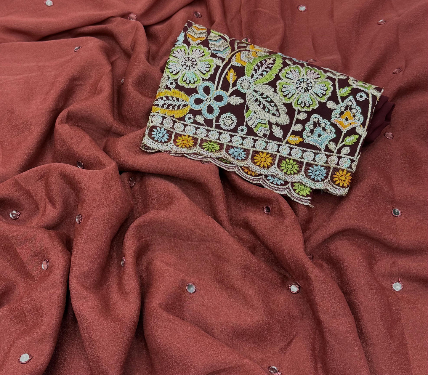 NN-2058 star georgett chiffon fabric with mirror work allover sareewith pipping and tussels with contrast sequence embroidary blouse