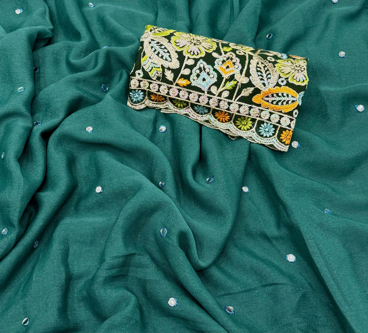 NN-2058 star georgett chiffon fabric with mirror work allover sareewith pipping and tussels with contrast sequence embroidary blouse