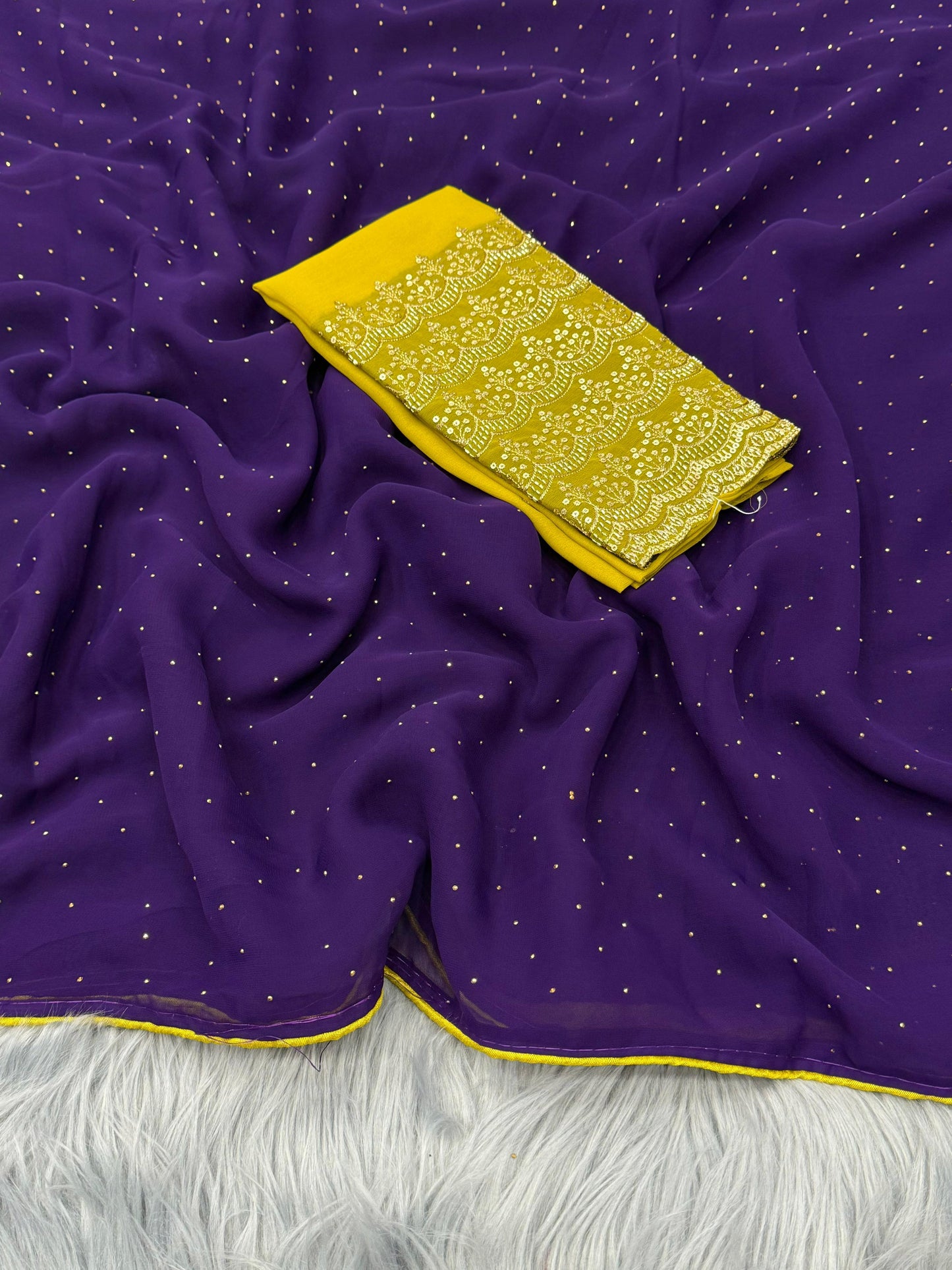 NN-2067  Georgette fabric with siroski allover saree with pipping and tussels on pallu with contrast heavy beads handwork blouse