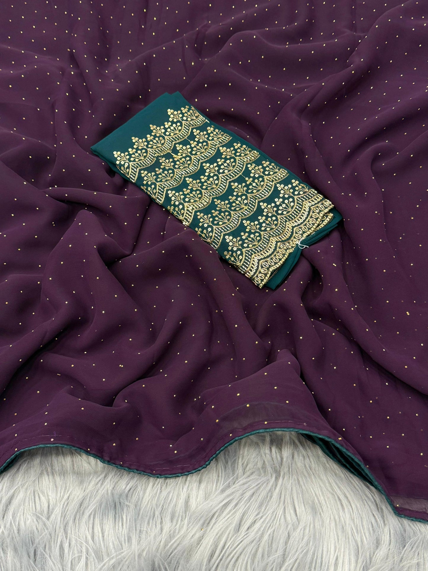 NN-2067  Georgette fabric with siroski allover saree with pipping and tussels on pallu with contrast heavy beads handwork blouse