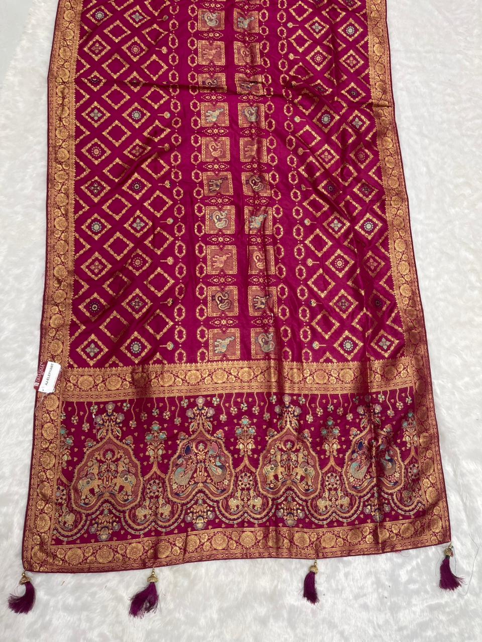 AJ-ELEPHANT EUROPIAN DOLA SILK WITH RICH PALLU WITH SPEICAL BANDANI MIX WITH PATOLA DESIGN SUPER TRENDING ARTICLE WITH LUXURY TASSELS
