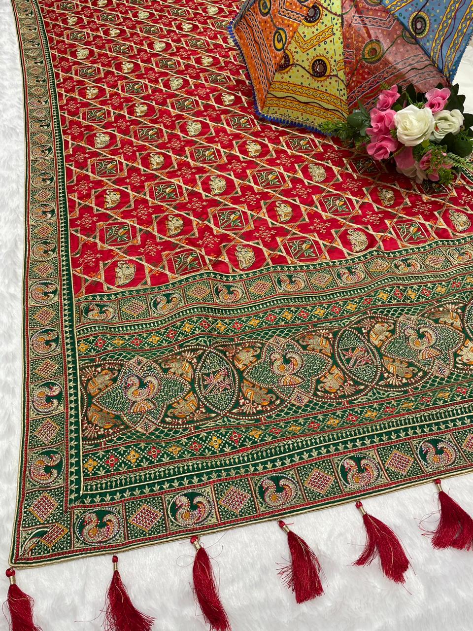 BS-CHANDPOL GAJJI SATIN SILK WITH HEAVY VISCOS DESIGN WITH MULTI WORK AND HEAY JARKAN WORK WUTH BEAUTIFUL DESIGN WITH TASSELS