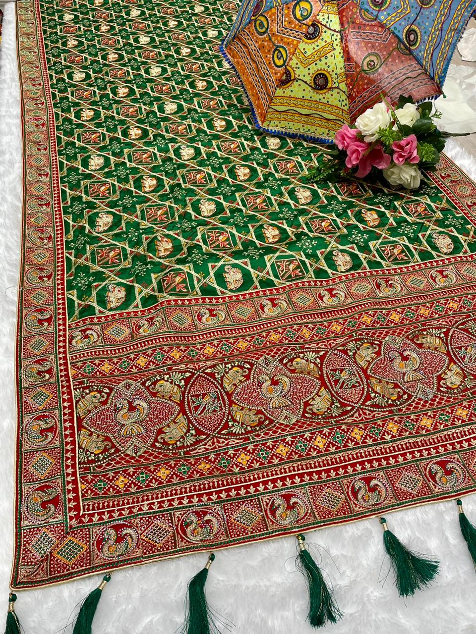 BS-CHANDPOL GAJJI SATIN SILK WITH HEAVY VISCOS DESIGN WITH MULTI WORK AND HEAY JARKAN WORK WUTH BEAUTIFUL DESIGN WITH TASSELS