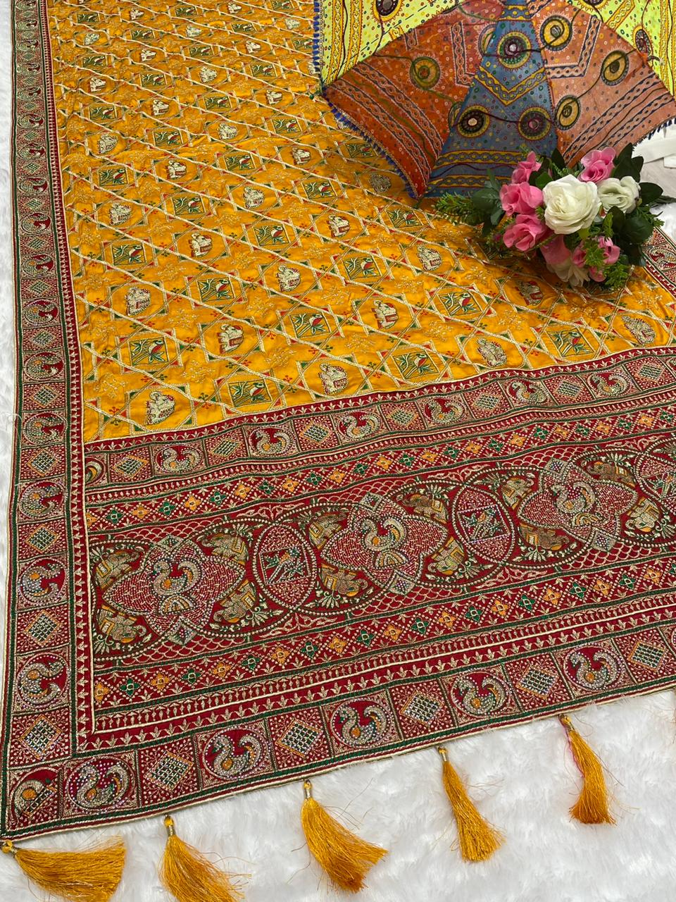 BS-CHANDPOL GAJJI SATIN SILK WITH HEAVY VISCOS DESIGN WITH MULTI WORK AND HEAY JARKAN WORK WUTH BEAUTIFUL DESIGN WITH TASSELS
