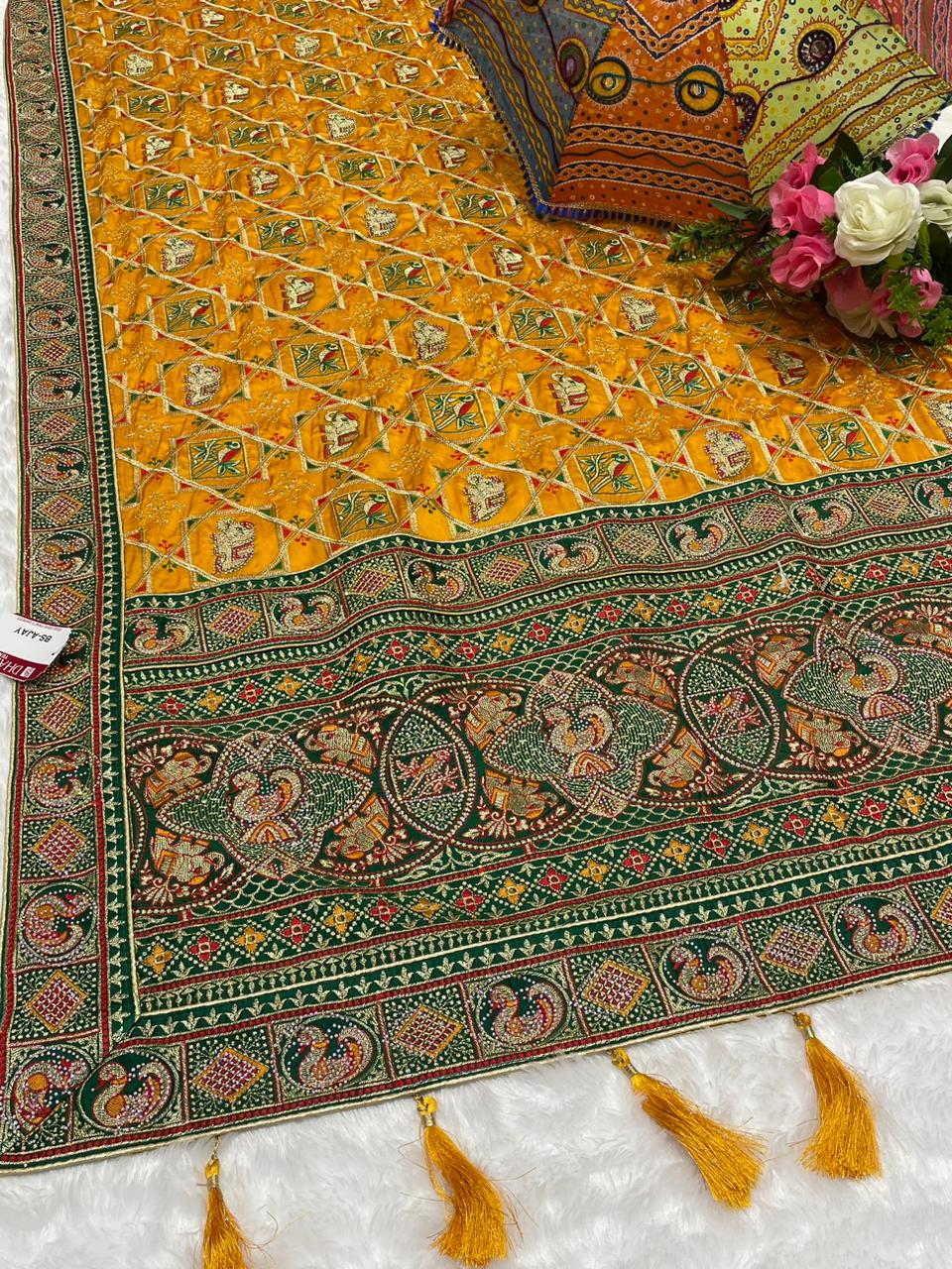 BS-CHANDPOL GAJJI SATIN SILK WITH HEAVY VISCOS DESIGN WITH MULTI WORK AND HEAY JARKAN WORK WUTH BEAUTIFUL DESIGN WITH TASSELS
