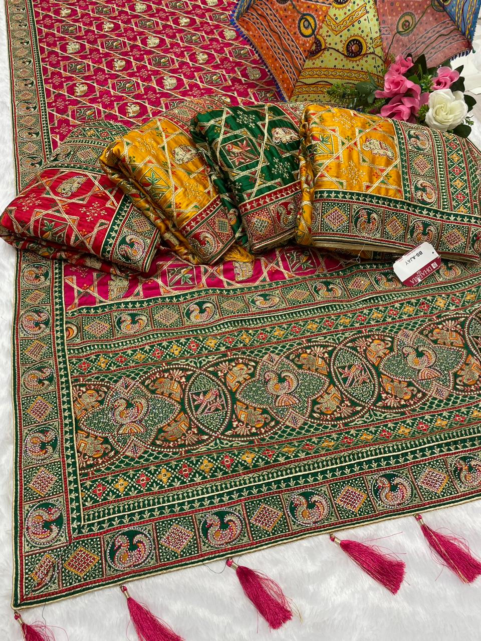 BS-CHANDPOL GAJJI SATIN SILK WITH HEAVY VISCOS DESIGN WITH MULTI WORK AND HEAY JARKAN WORK WUTH BEAUTIFUL DESIGN WITH TASSELS