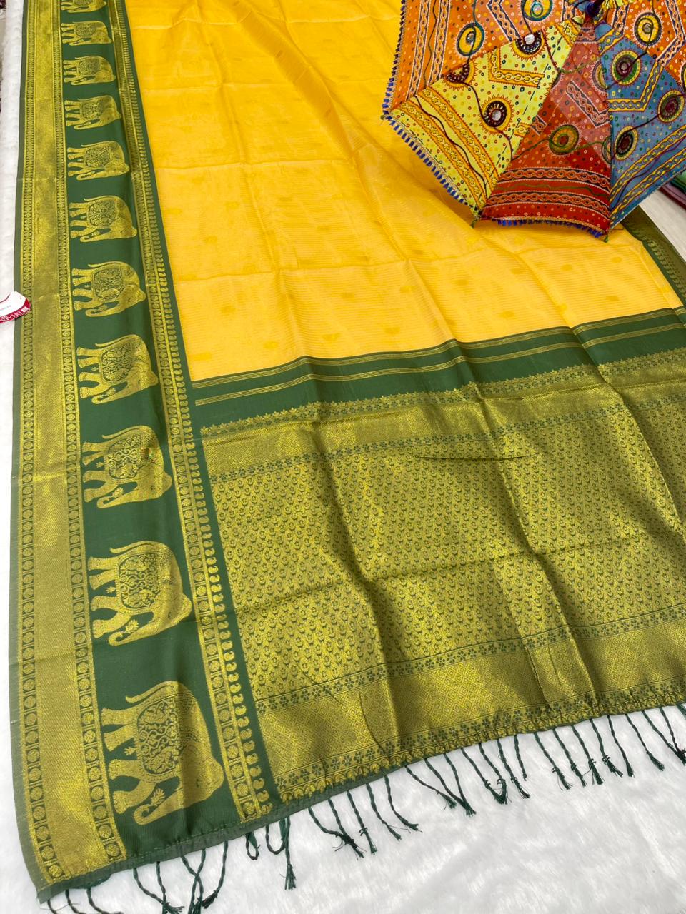 AJ-COTTON-AHINSA COTTON SILK WITH RICH PALLU WITH CONTRAST BORDER WITH GAJRAJ DESIGN WITH UNIQUE BEAUTIFUL TASSELS