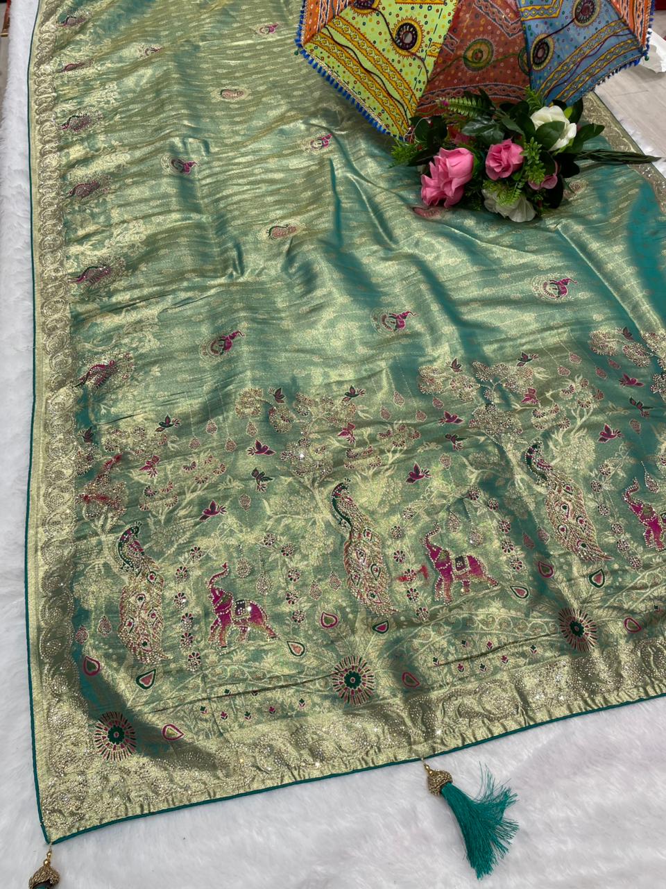 AJ-MALABAR Tissue saree with beautiful open pallu with gajraj and peacock design with jarkan work with meenakri work and diamond border with contrast brocade blouse with luxury tassels