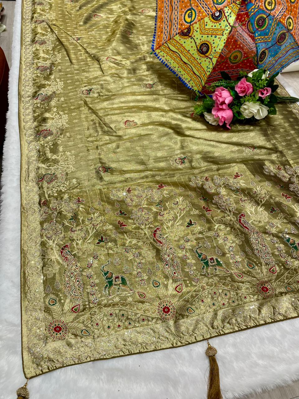AJ-MALABAR Tissue saree with beautiful open pallu with gajraj and peacock design with jarkan work with meenakri work and diamond border with contrast brocade blouse with luxury tassels
