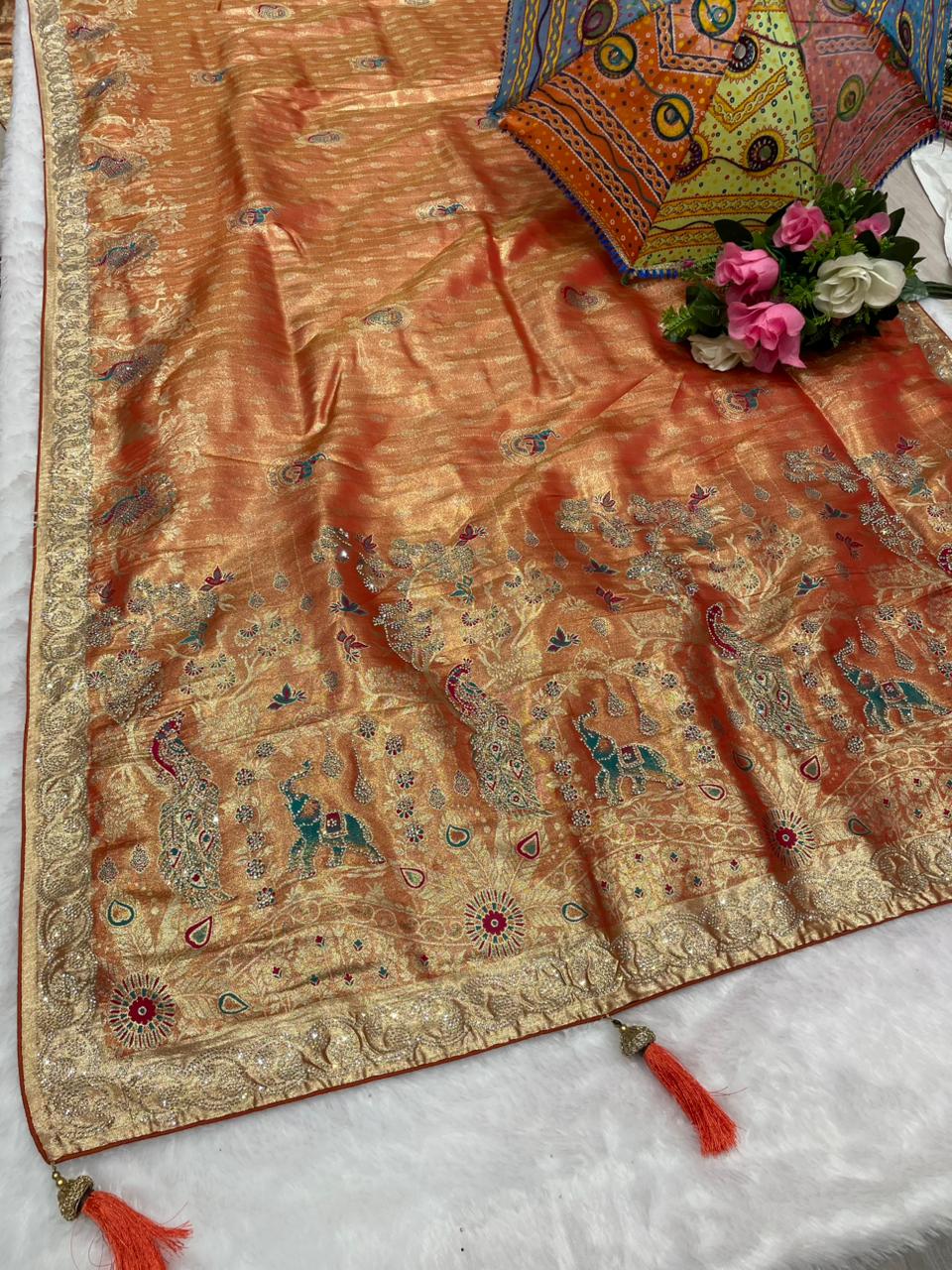 AJ-MALABAR Tissue saree with beautiful open pallu with gajraj and peacock design with jarkan work with meenakri work and diamond border with contrast brocade blouse with luxury tassels