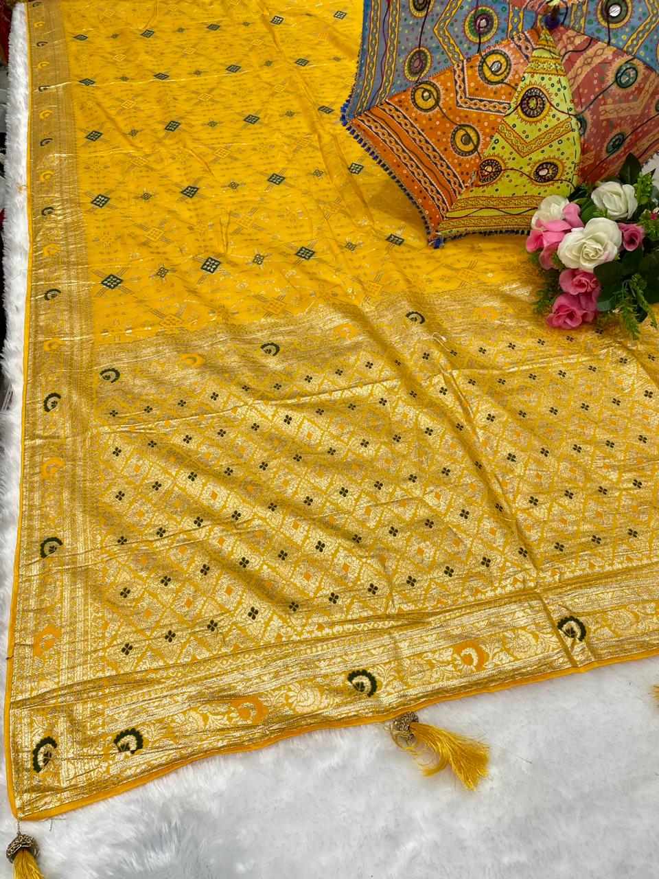 AJ-ICE CUBE DOLA SILK SAREE WITH TRENDING DESIGN WITH LITTLE BANDANI INSERTS WITH RICH PALLU AND HEAVY TASSELS