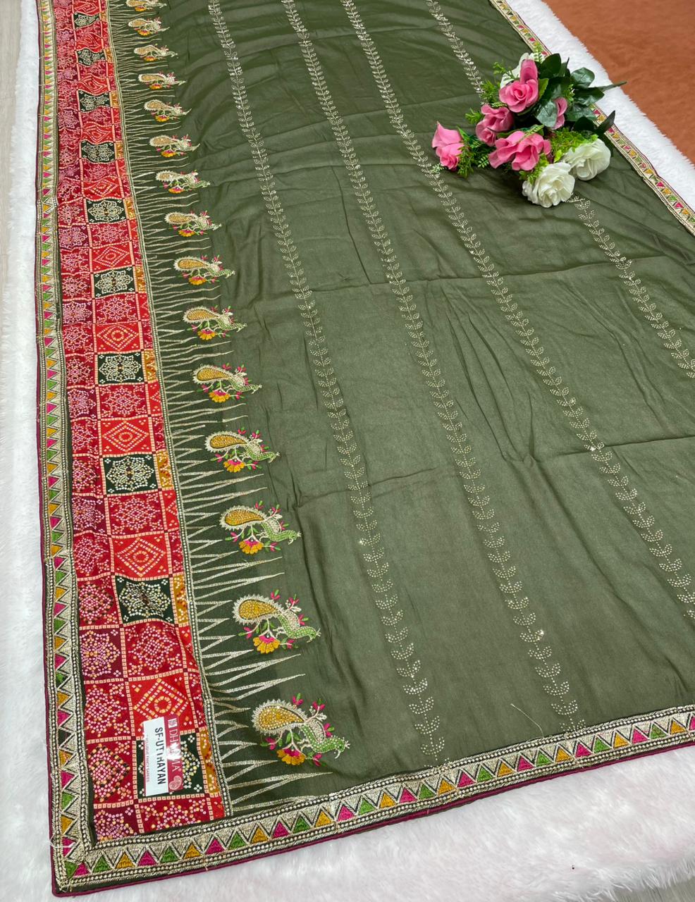 SF-UTTRAYAN Star georgette fabric saree with beautiful bandhani border with embroidery work with thread work beautiful peacock design and dmc siroski work with blouse
