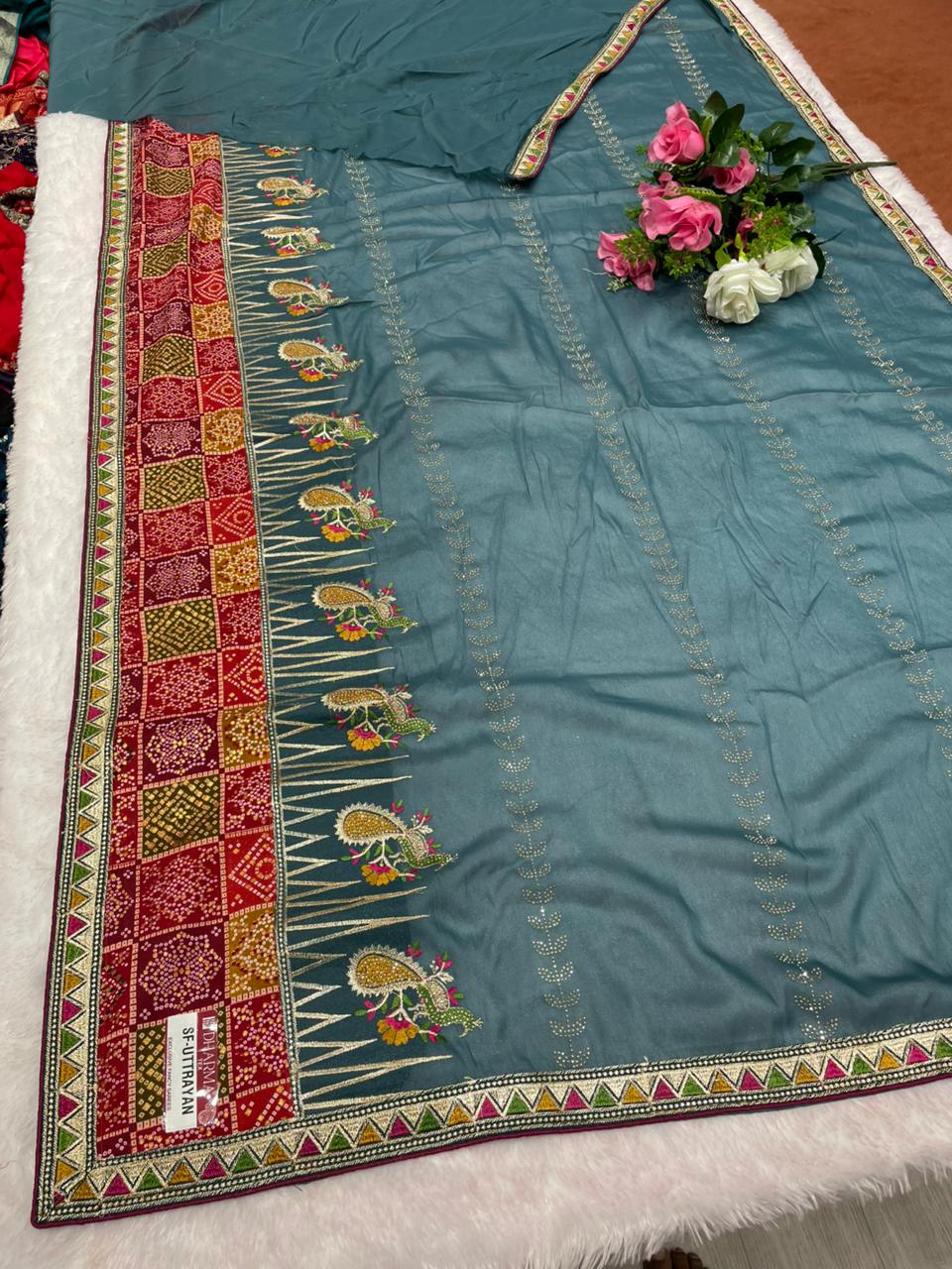 SF-UTTRAYAN Star georgette fabric saree with beautiful bandhani border with embroidery work with thread work beautiful peacock design and dmc siroski work with blouse