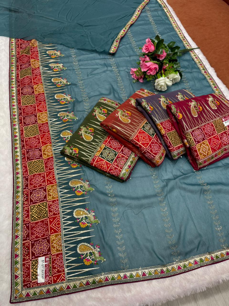 SF-UTTRAYAN Star georgette fabric saree with beautiful bandhani border with embroidery work with thread work beautiful peacock design and dmc siroski work with blouse