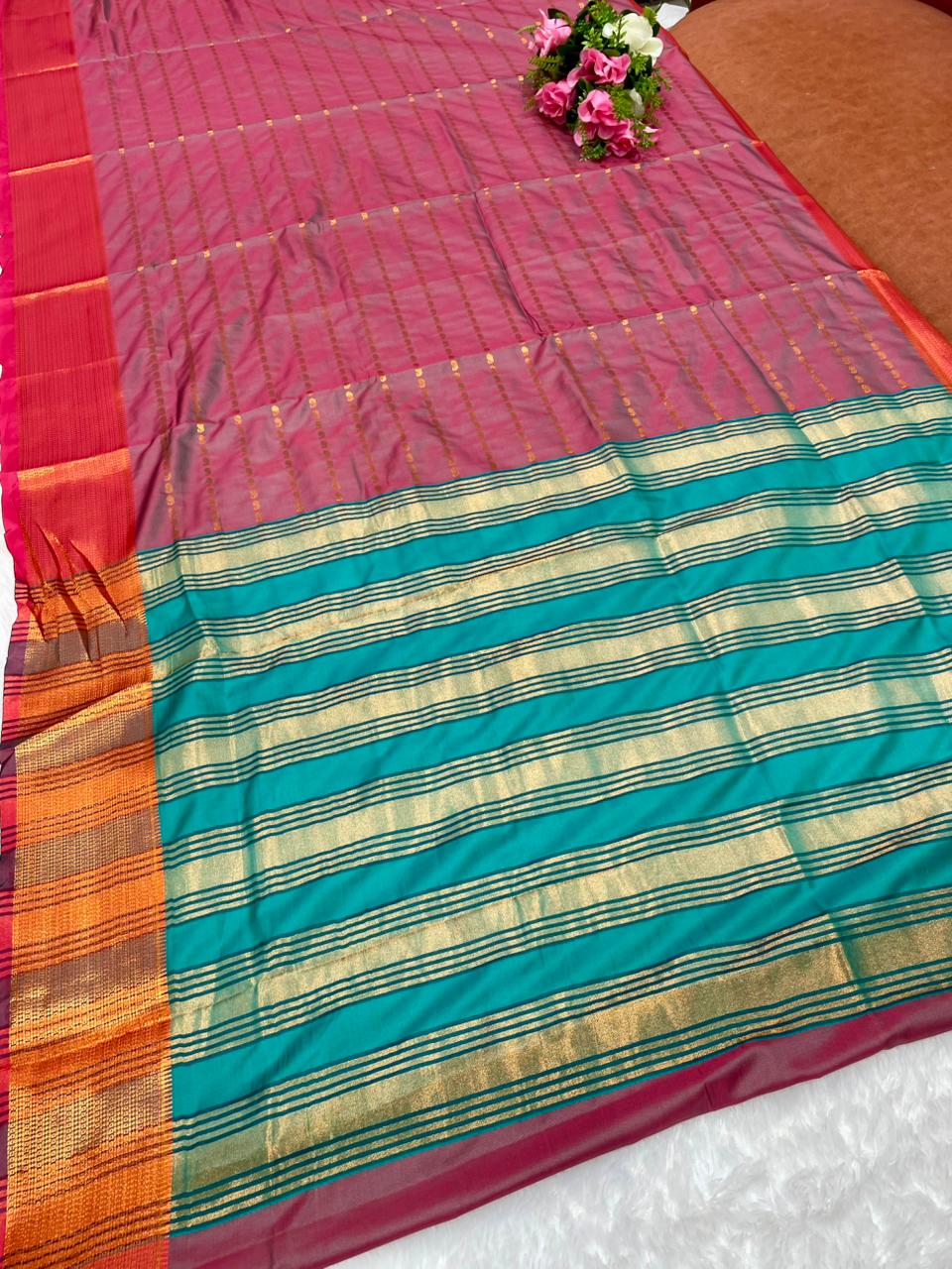AJ-ROSE GOLD-A SOFT SILK SAREE WITH COPPER JAREE WITH RICH PALLU DEISGN WITH CONTINUE WEAVING DESIGN WITH CONTRAST BLOUSE