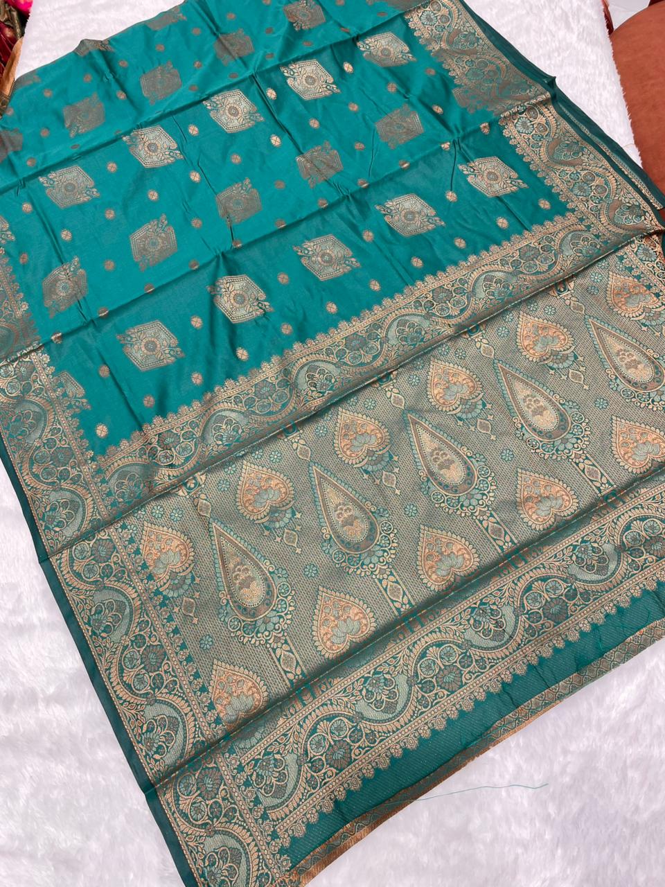 AJ-GAURAVI SOFT LITCHI KOTA SILK WITH RICH PALLU AND BEAUTIFUL DESIGN WITH BEAUTIFUL BEOCADE BLOUSE