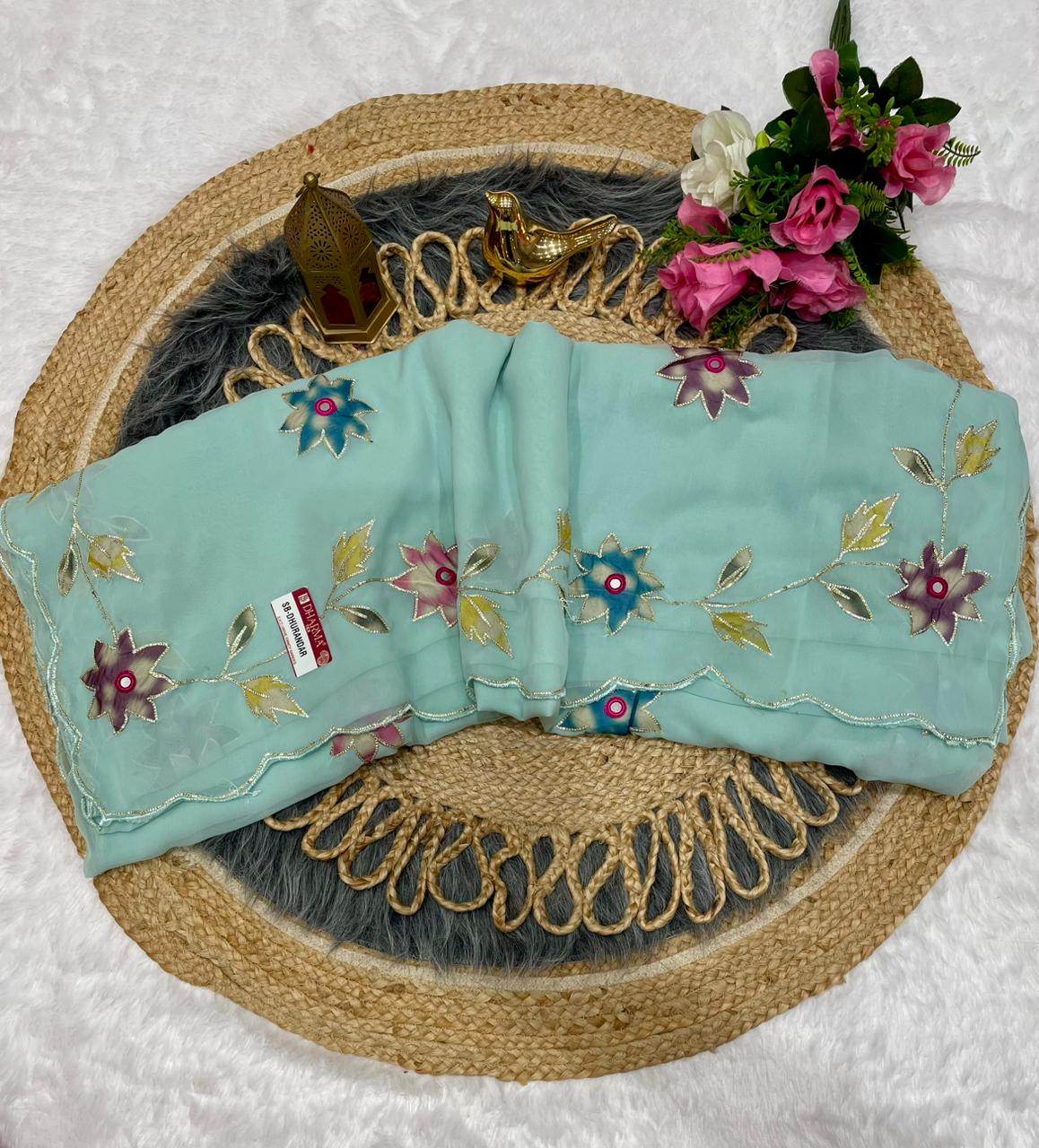 SB-DHURANDAR STAR GEORGETTE SAREE WITH BEAUTIFUL RIBBON WITH MIRROR WKRM WITH BEAUTIFUL CUTWORK BORDER WITH WORK BLOUSE