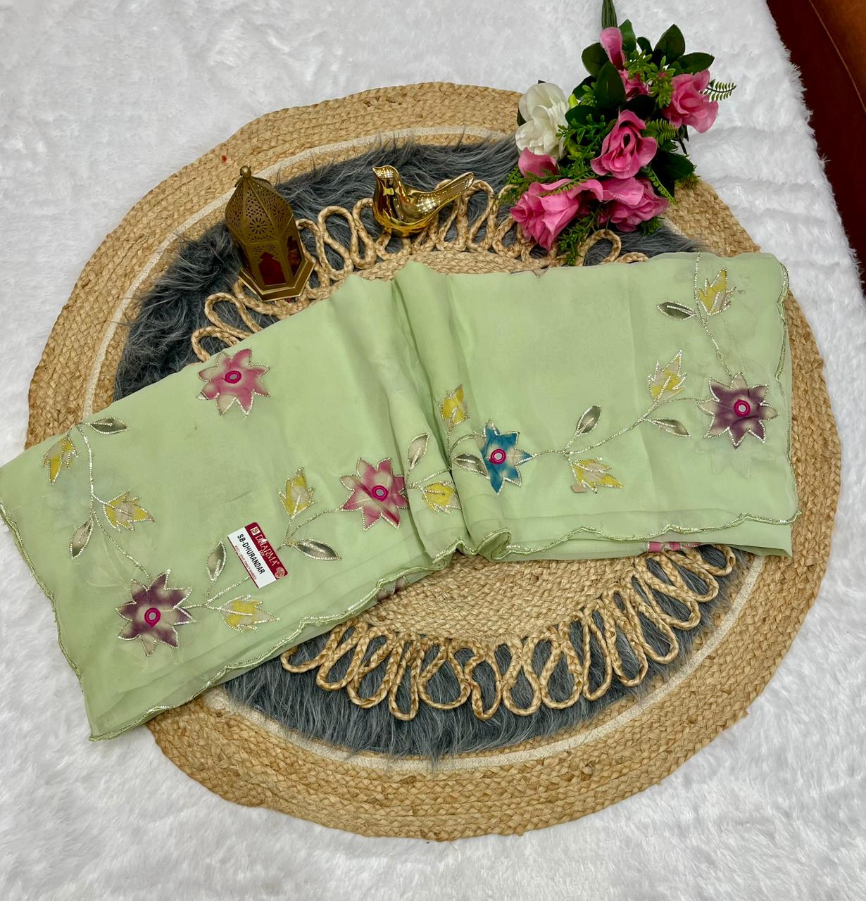 SB-DHURANDAR STAR GEORGETTE SAREE WITH BEAUTIFUL RIBBON WITH MIRROR WKRM WITH BEAUTIFUL CUTWORK BORDER WITH WORK BLOUSE