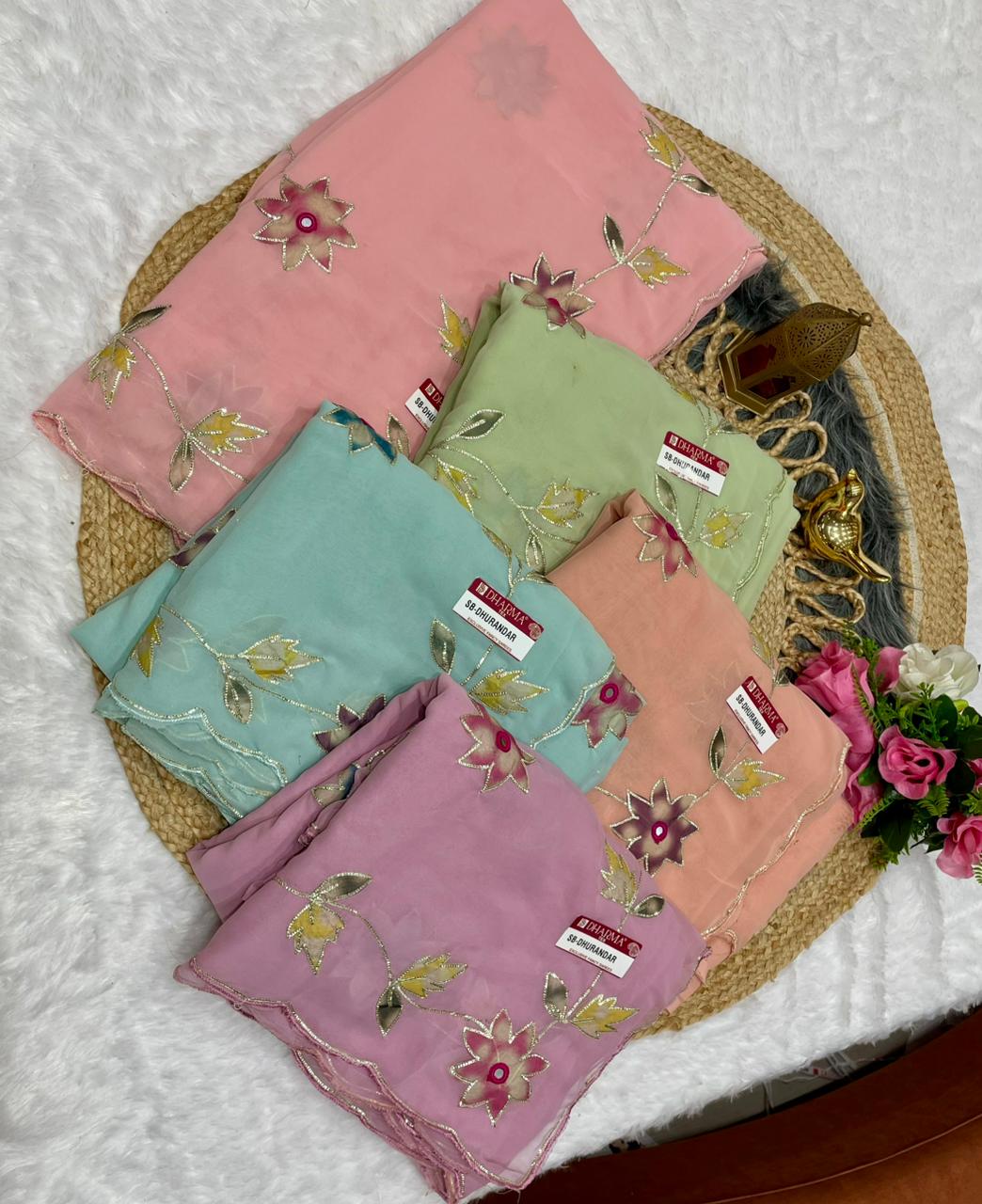 SB-DHURANDAR STAR GEORGETTE SAREE WITH BEAUTIFUL RIBBON WITH MIRROR WKRM WITH BEAUTIFUL CUTWORK BORDER WITH WORK BLOUSE