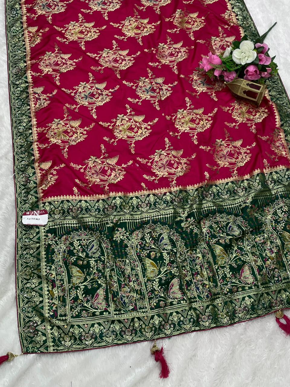 AJ-TITALI  SATIN SILK WITH BEAUTFUL PALLU WITH HEAVY DESIGN WITH JARKAN WORK WITH BEAUTIFUL BUTTERFLY DESIGN ON BODY AND PALLU WITH MEENAKARI WORK AND LUXURIOUS TASSELS WITH CONTRAST BUTTI BLOUSE