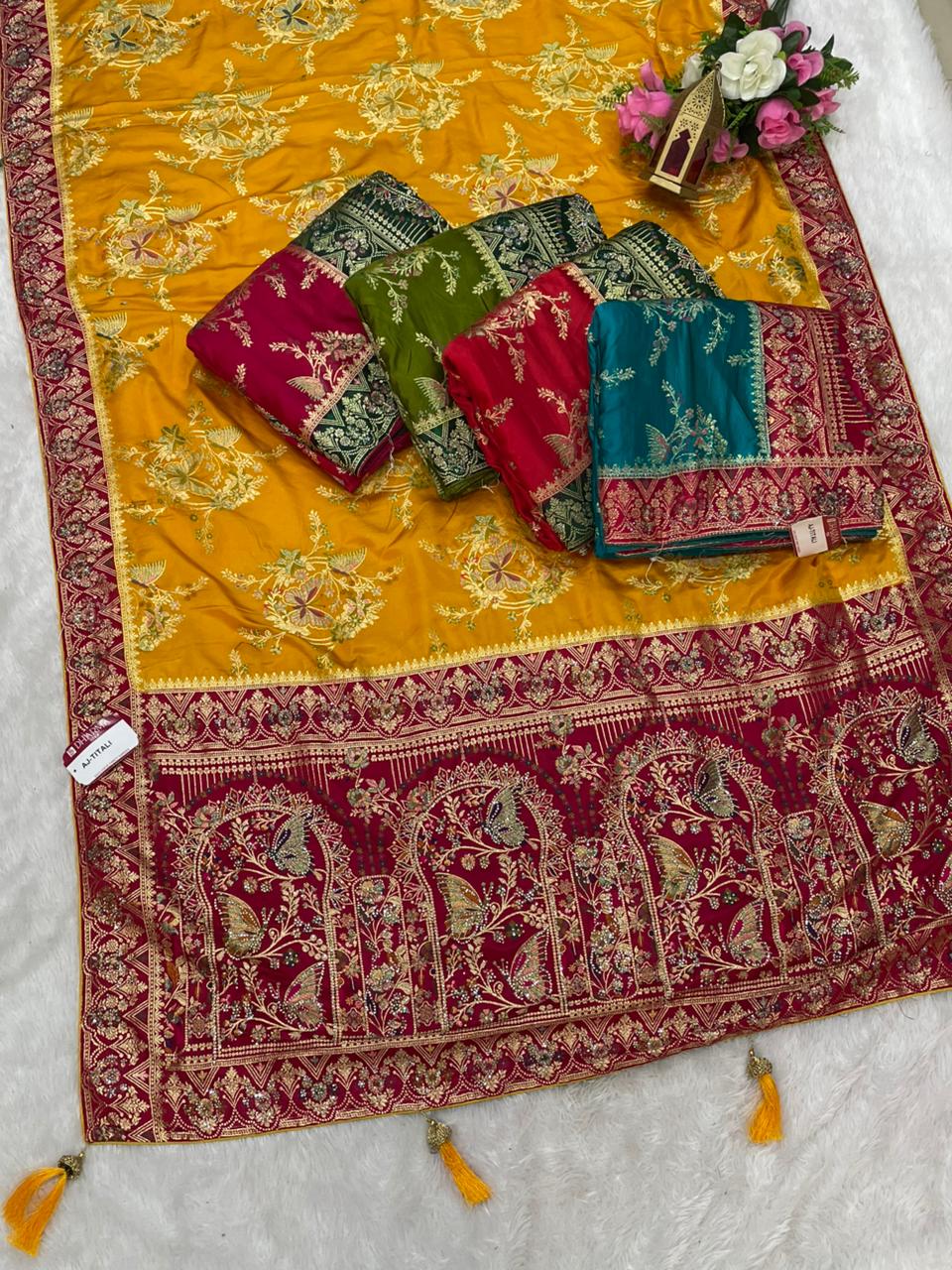AJ-TITALI  SATIN SILK WITH BEAUTFUL PALLU WITH HEAVY DESIGN WITH JARKAN WORK WITH BEAUTIFUL BUTTERFLY DESIGN ON BODY AND PALLU WITH MEENAKARI WORK AND LUXURIOUS TASSELS WITH CONTRAST BUTTI BLOUSE