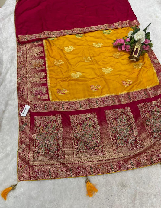 AJ-MIRA SATIN SILK WITH BEAUTFUL GRAND PALLU WITH HEAVY DESIGN WITH JARKAN WORK WITH MEENAKARI WORK AND LUXURIOUS TASSELS WITH CONTRAST BUTTI BLOUSE