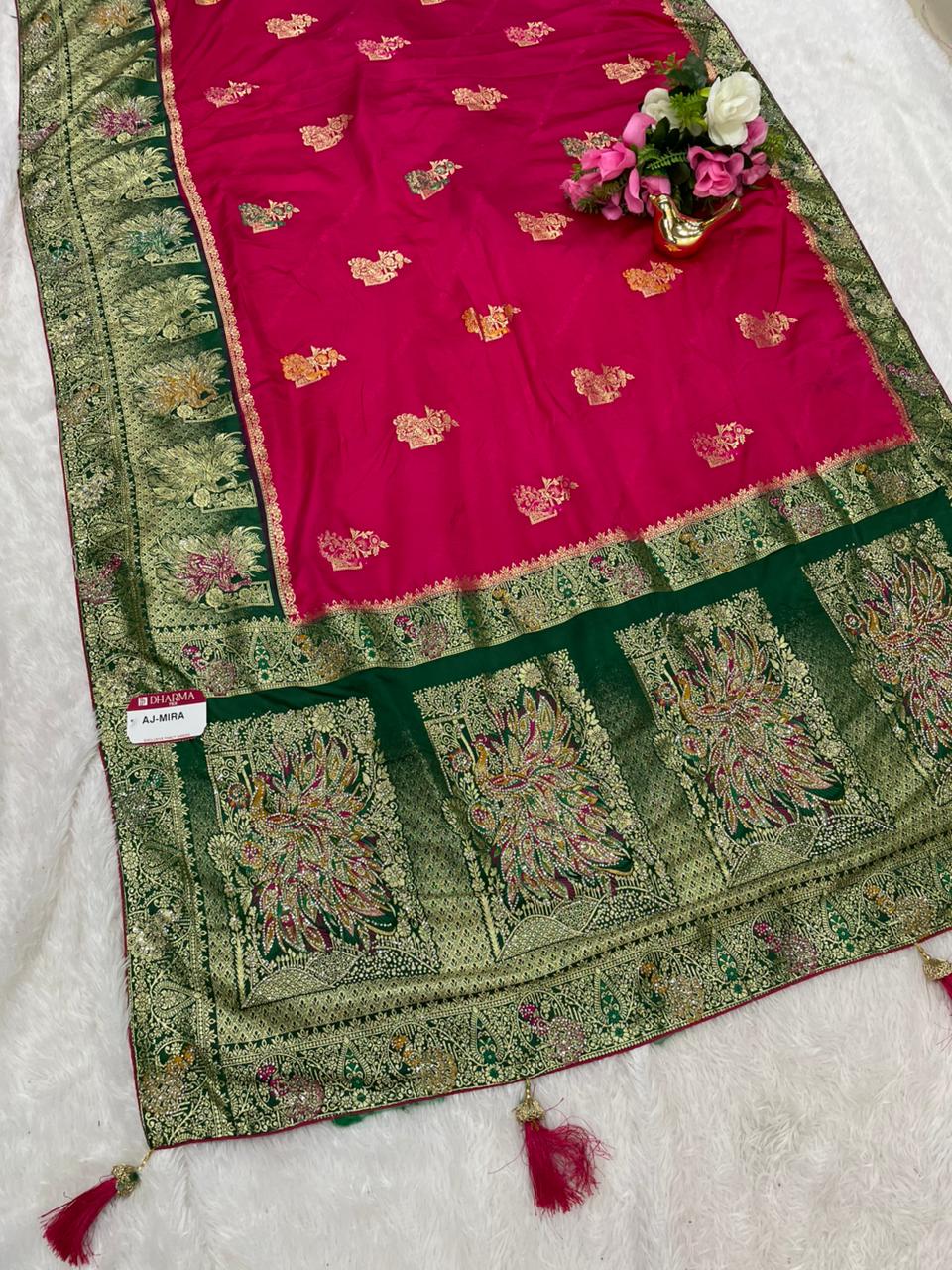 AJ-MIRA SATIN SILK WITH BEAUTFUL GRAND PALLU WITH HEAVY DESIGN WITH JARKAN WORK WITH MEENAKARI WORK AND LUXURIOUS TASSELS WITH CONTRAST BUTTI BLOUSE